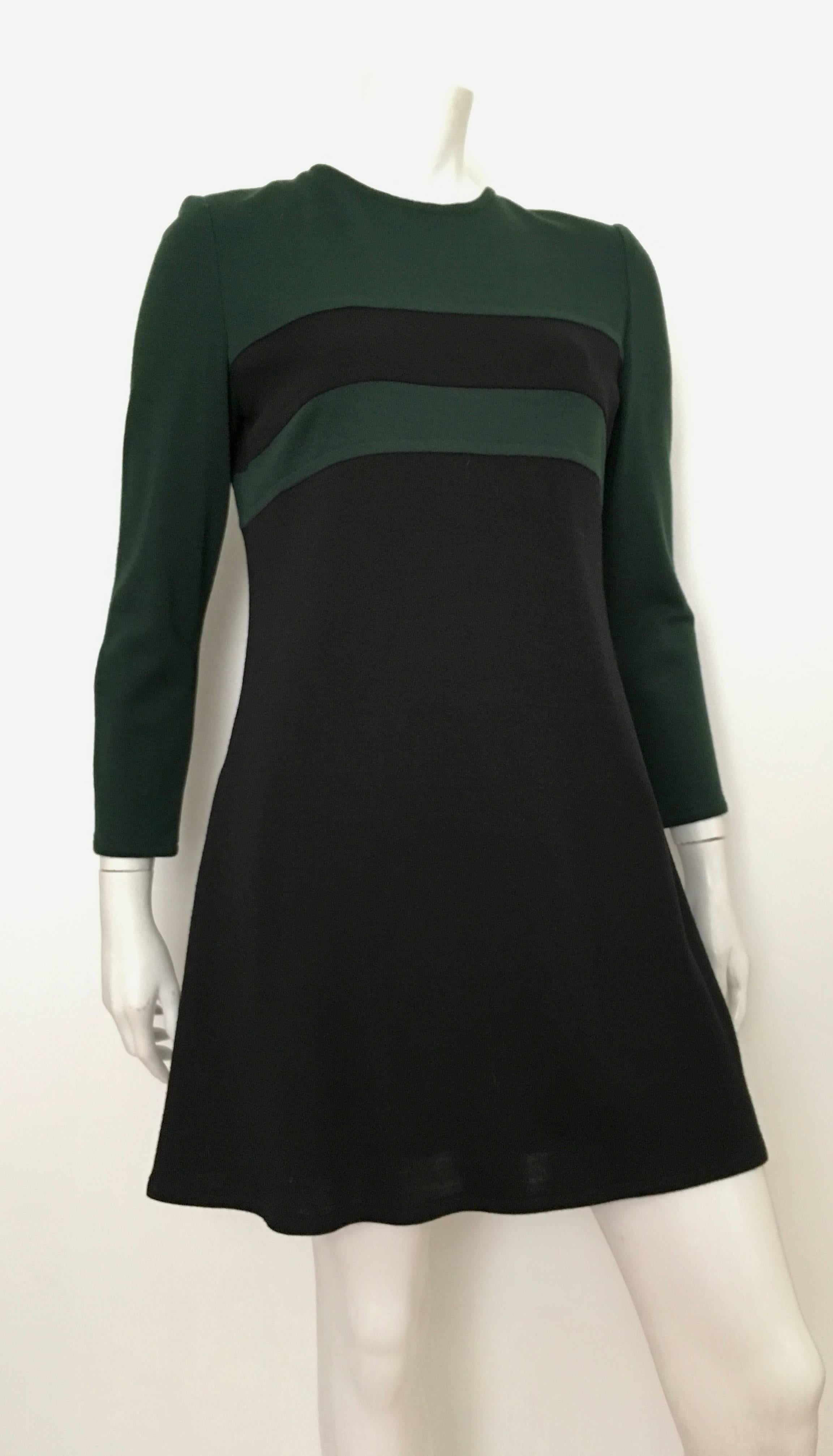 Bill Blass 1970s MOD designed wool mini dress with pockets is a vintage size 8 but fits like a modern USA size 6.  Ladies please take your tape measure out and properly measure your bust, waist & hips to make certain this dress will fit your lovely