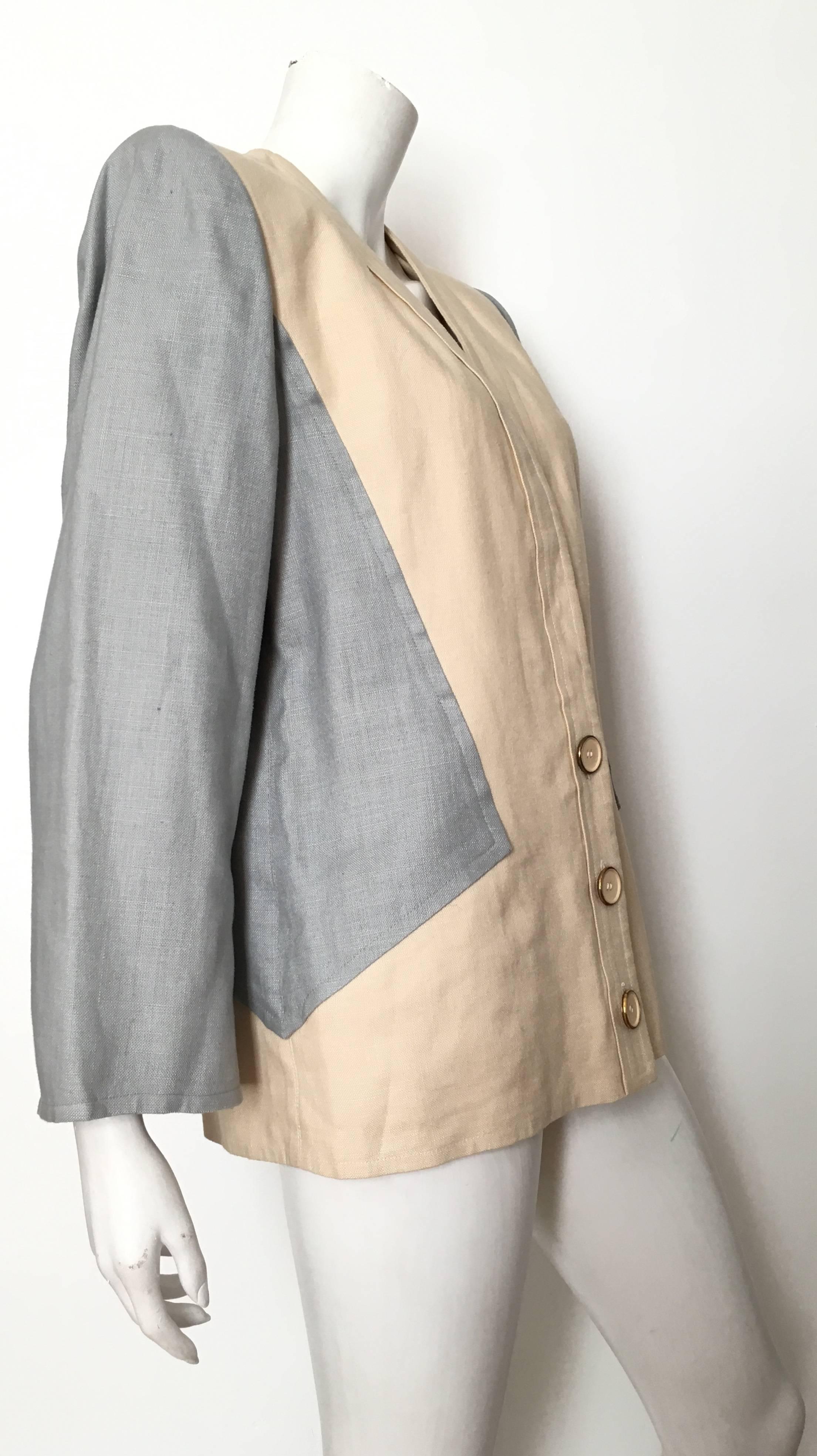 Jacqueline de Ribes 1980s cream & light blue grey linen jacket is a size large and will fit an USA size 8 / 10. The design of this jacket is supposed to be boxy and oversized, casual elegance.  Jacket is not lined. Jacket has pleats on the backside