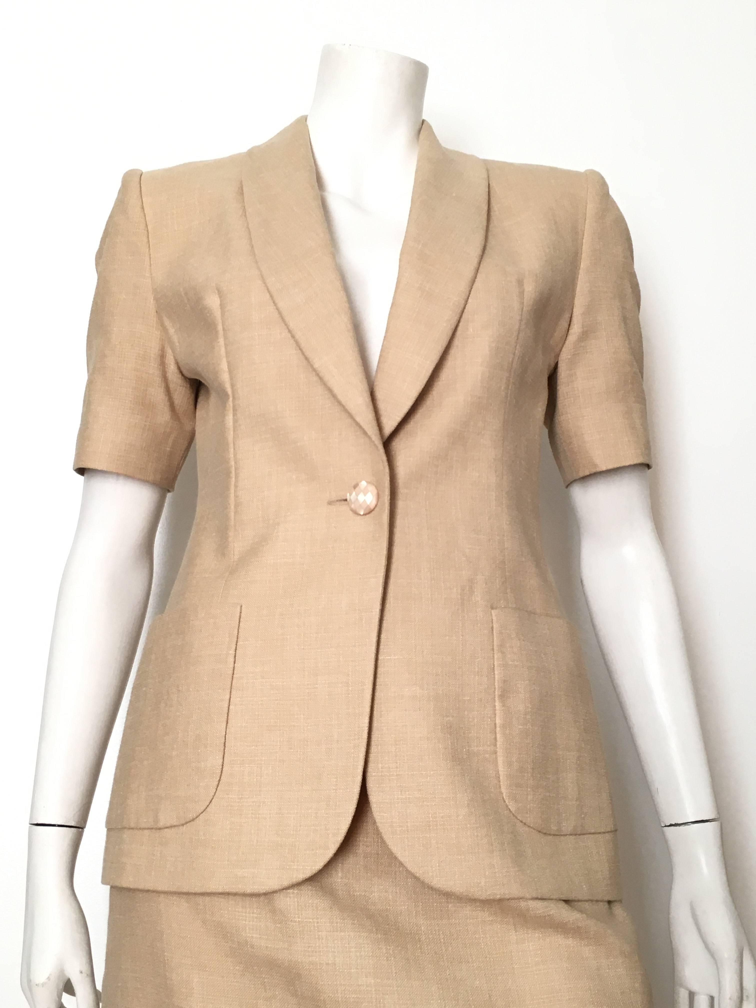 Givenchy Couture 1990s tan linen-silk-wool jacket & skirt set is a French size 40 and fits an USA size 6.  Ladies please grab your best boyfriend, Mr. Tape Measure, and measure your bust, waist & hips to make certain this gorgeous suit will