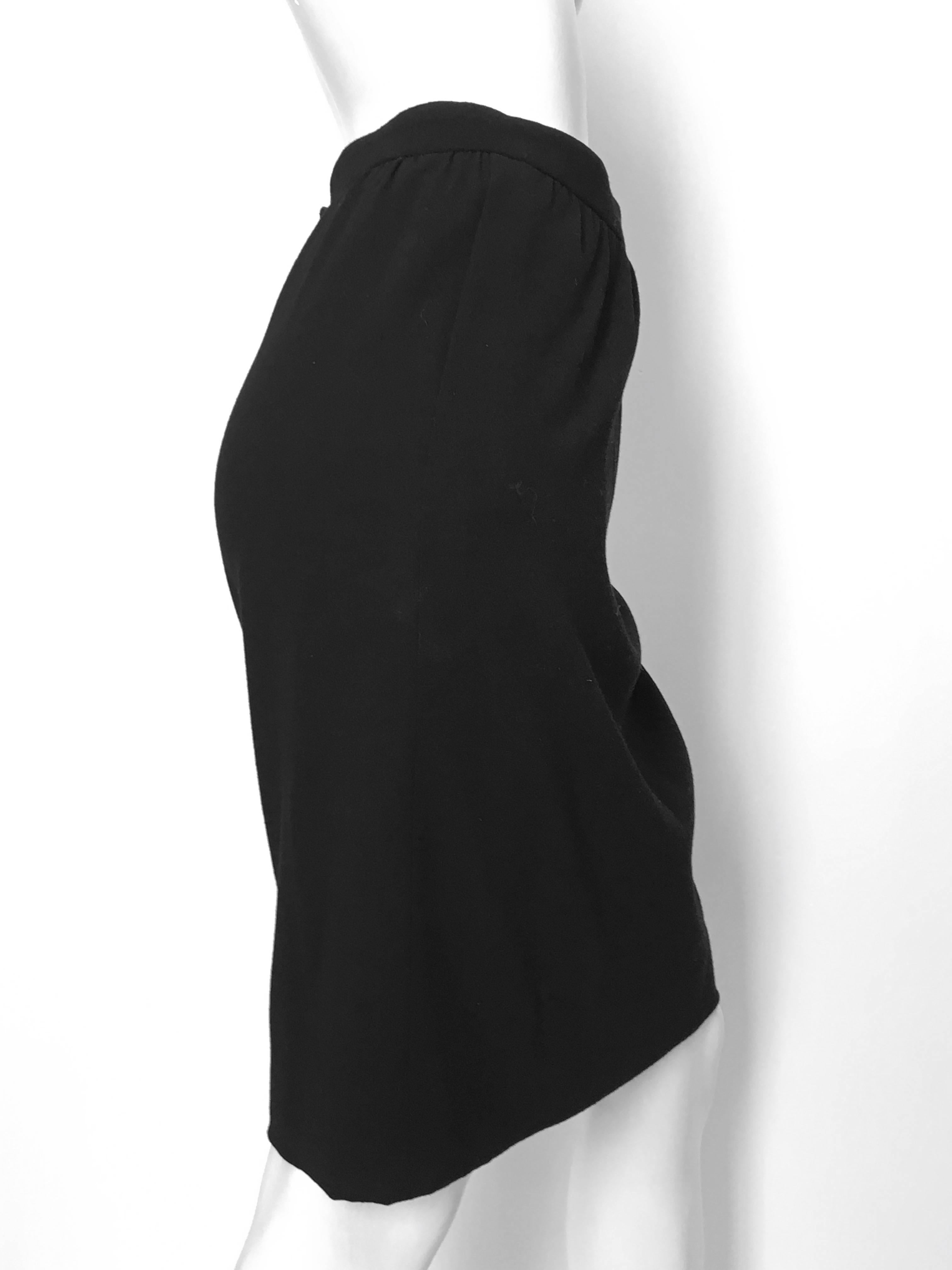 Women's or Men's Chanel 1980s Black Wool Skirt with Pockets Size 12. For Sale