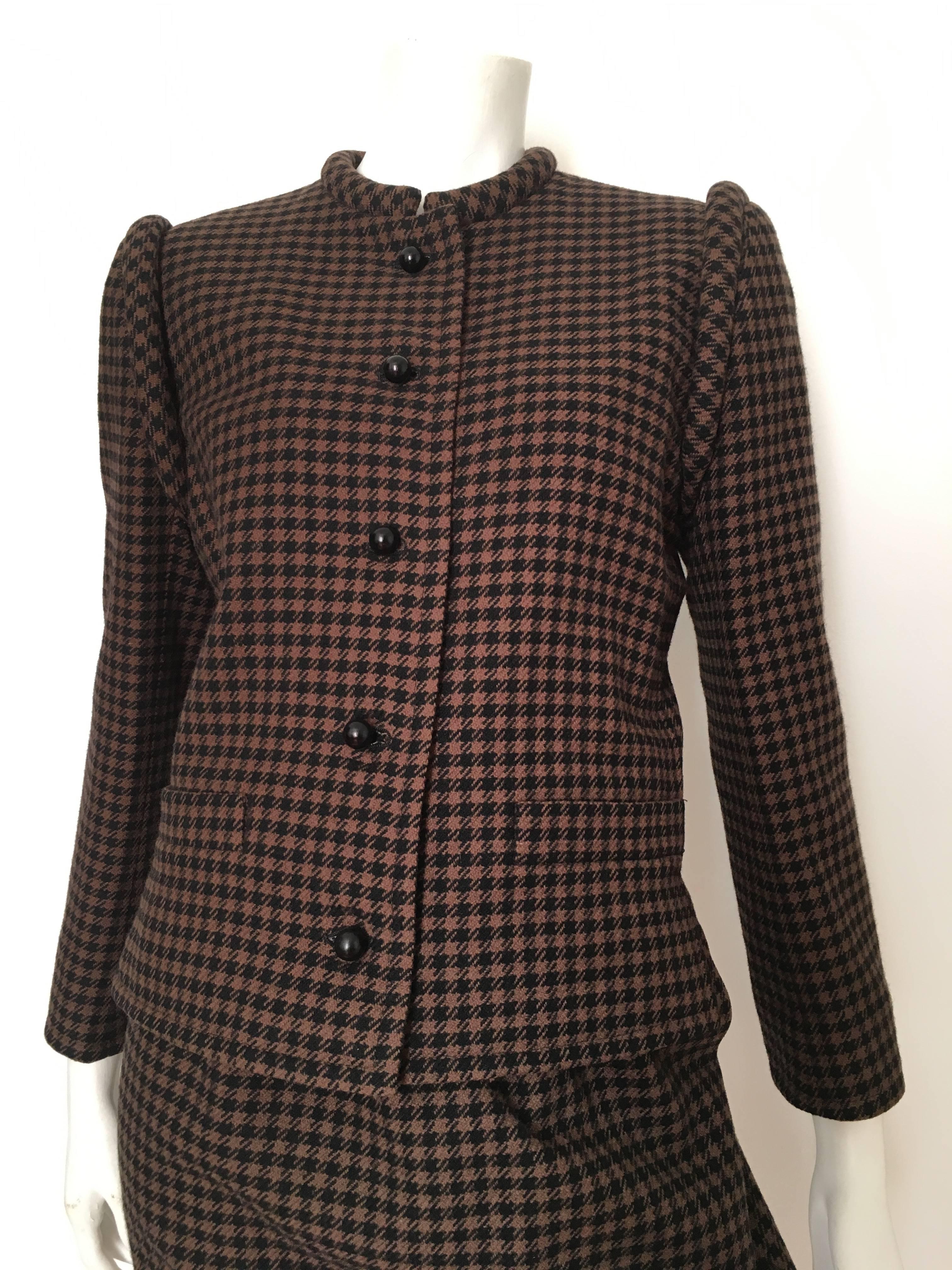 Nina Ricci Boutique 1970s wool brown & black houndstooth pattern jacket & skirt set fits like an USA size 6.  Ladies please grab your trusted best friend, Mr. Tape Measure, so you can properly measure your bust, waist, hips and sleeves to make