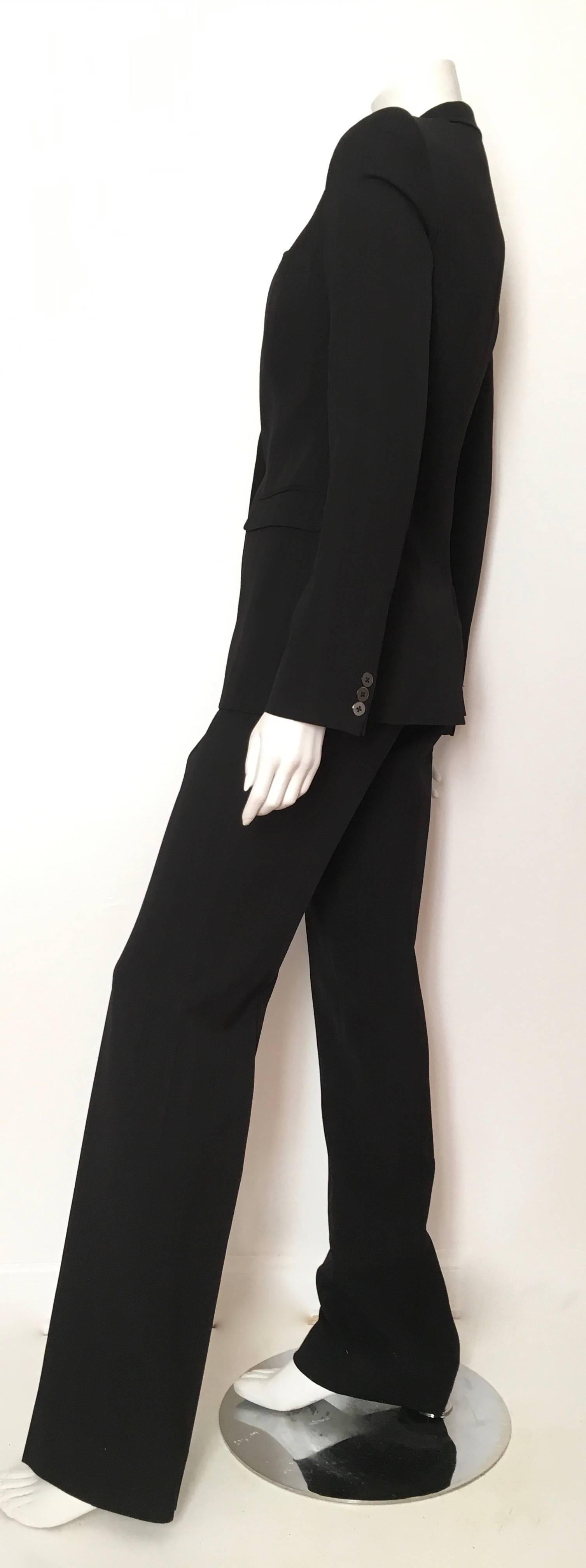 Women's or Men's Dolce & Gabbana Black Striped Wool Pant Suit with Cheetah lining Size 4. For Sale