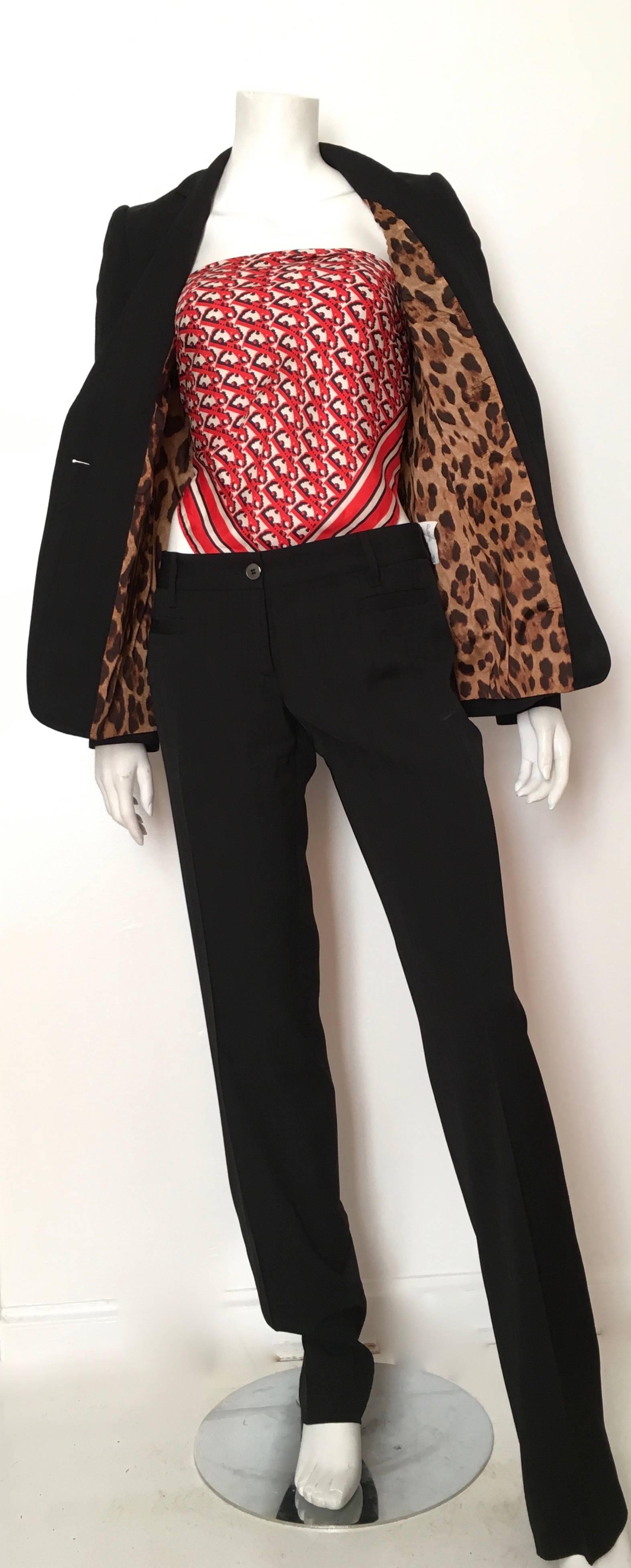 Dolce & Gabbana Black Striped Wool Pant Suit with Cheetah lining Size 4. For Sale 1