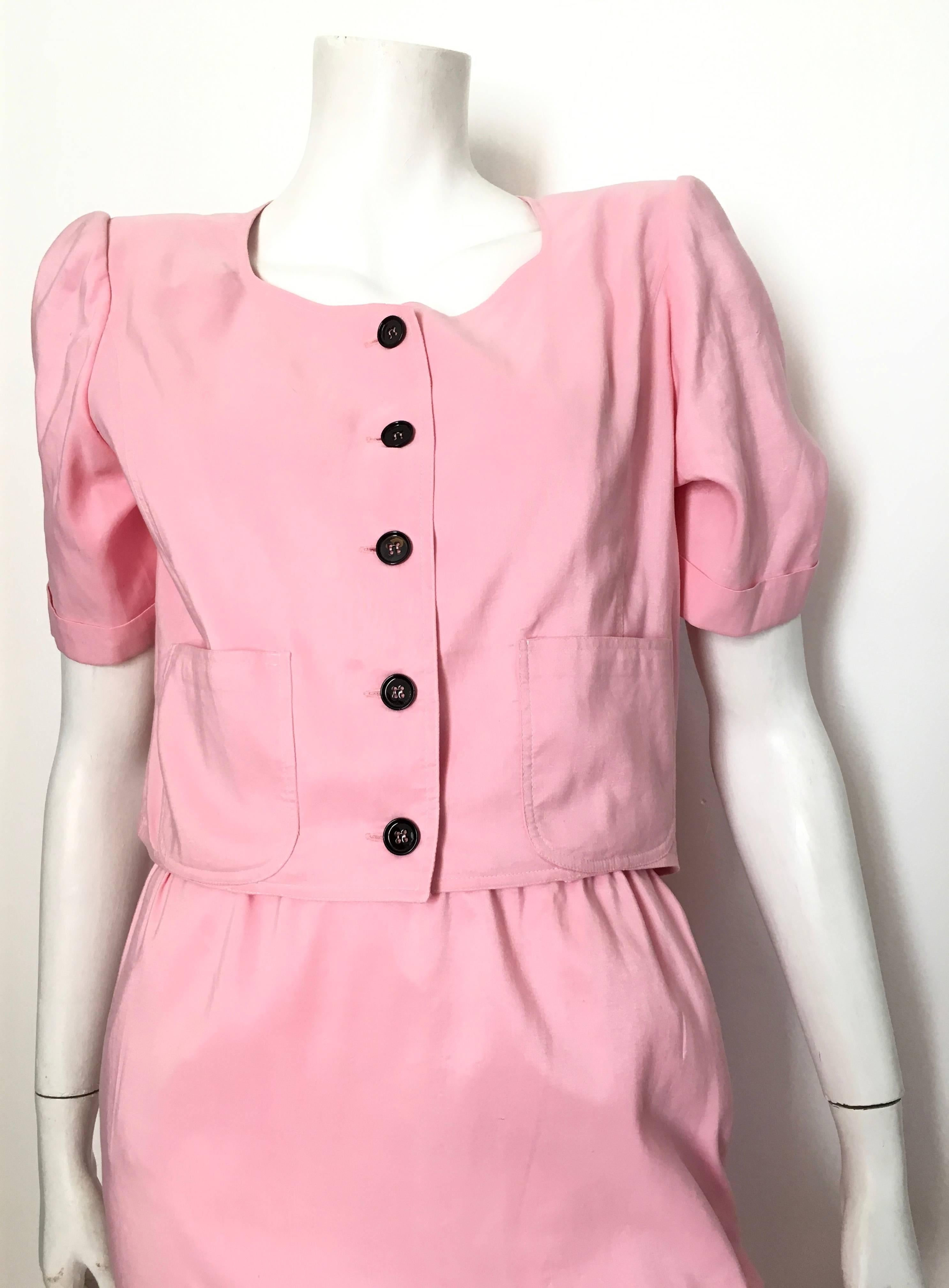 Emanuel Ungaro Solo Donna Paris pink cropped button up jacket & skirt is labeled size 6 but fits like an USA size 4.  Ladies please grab your most trusted friend, Mr. Tape Measure, so you can properly measure your bust, waist, hips to make certain