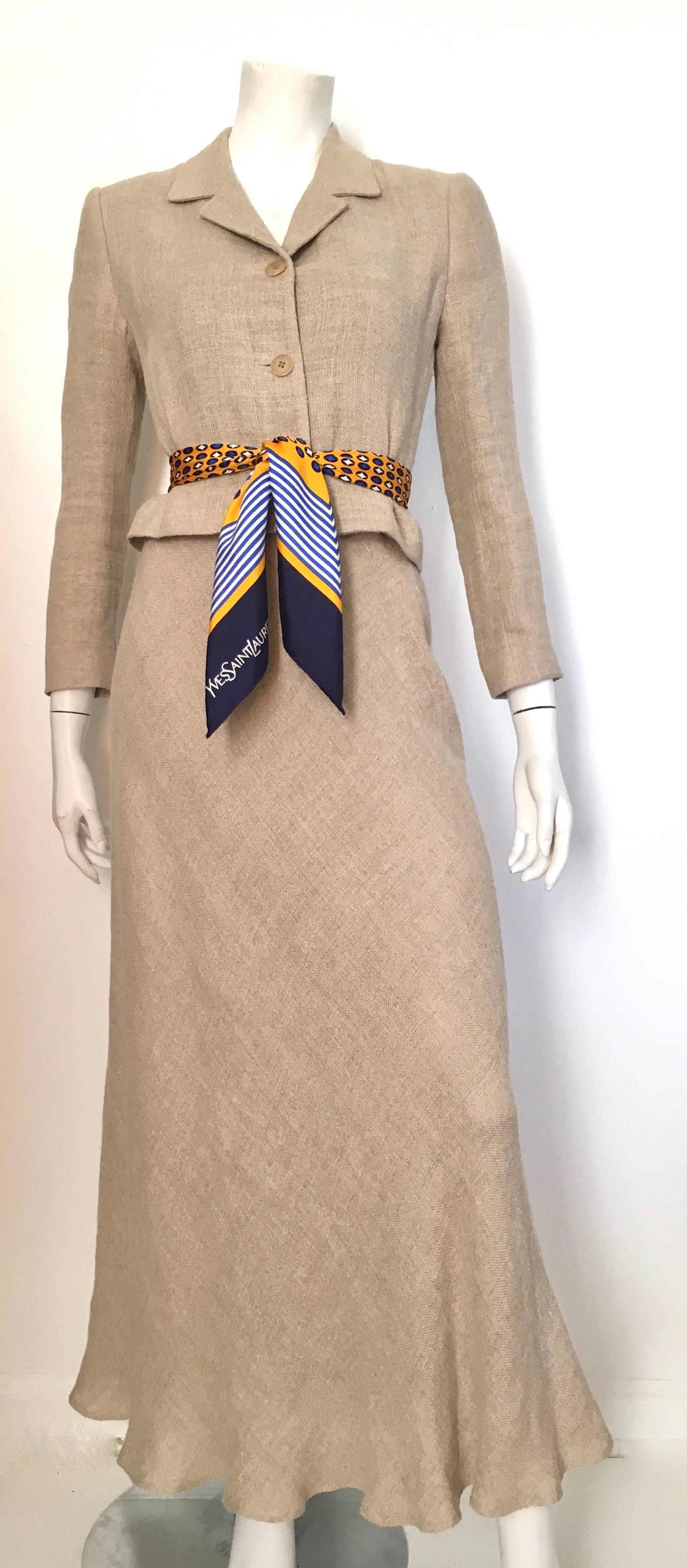 Ralph Lauren Purple Label Collection khaki linen long sleeve cropped jacket & long skirt is a size 4. This skirt set fits Matilda the Mannequin, who is a size 4, perfectly.  Ladies please grab your trusted friend, Mr. Tape Measure, so you can