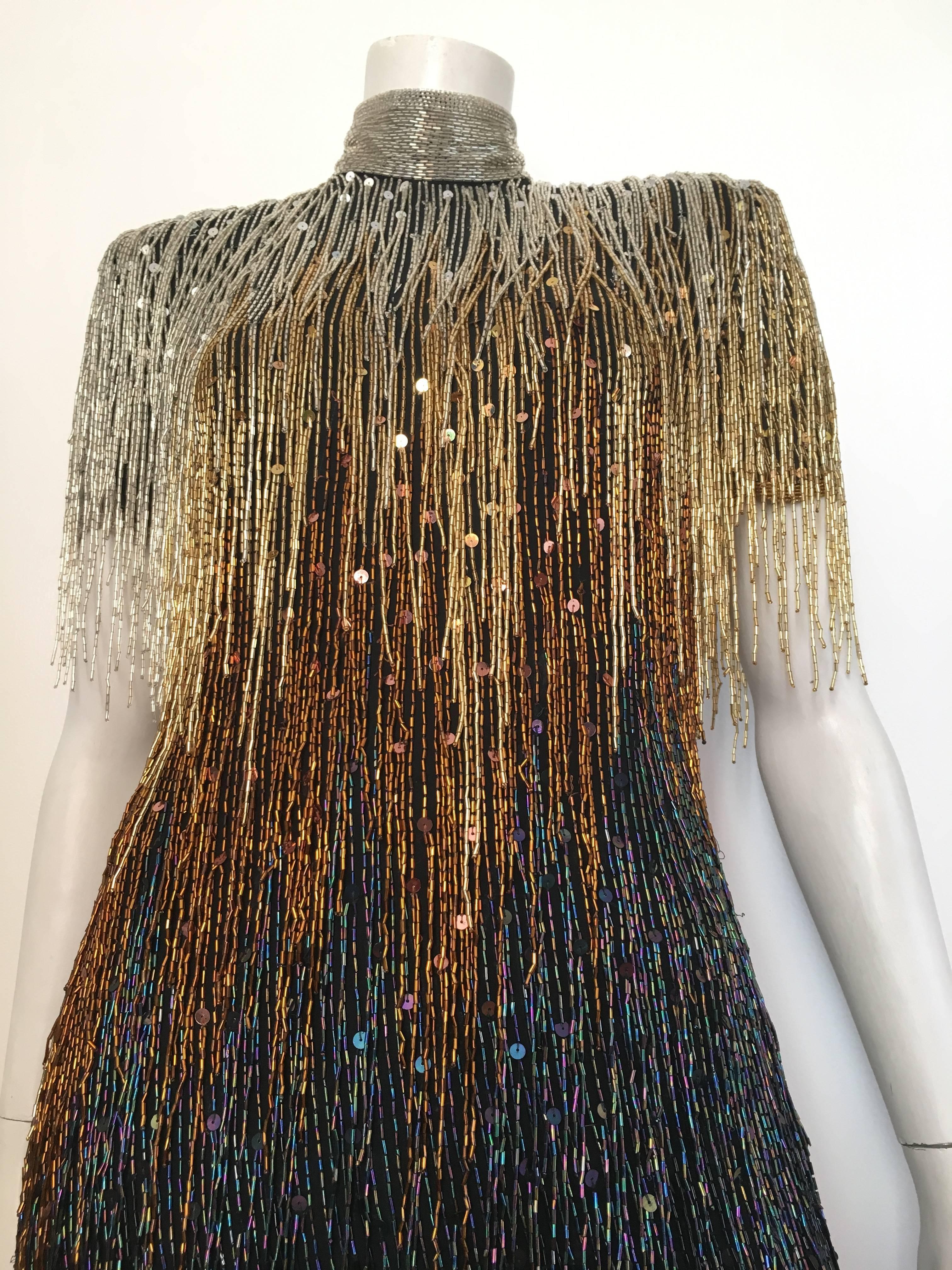 Naeem Khan Riazee for Neiman Marcus is a gorgeous Great Gatsby Embellished Flapper fringed beaded sequin evening cocktail dress that is a size 6. Ladies please grab your most trusted friend, Mr. Tape Measure, so you can properly measure your bust,