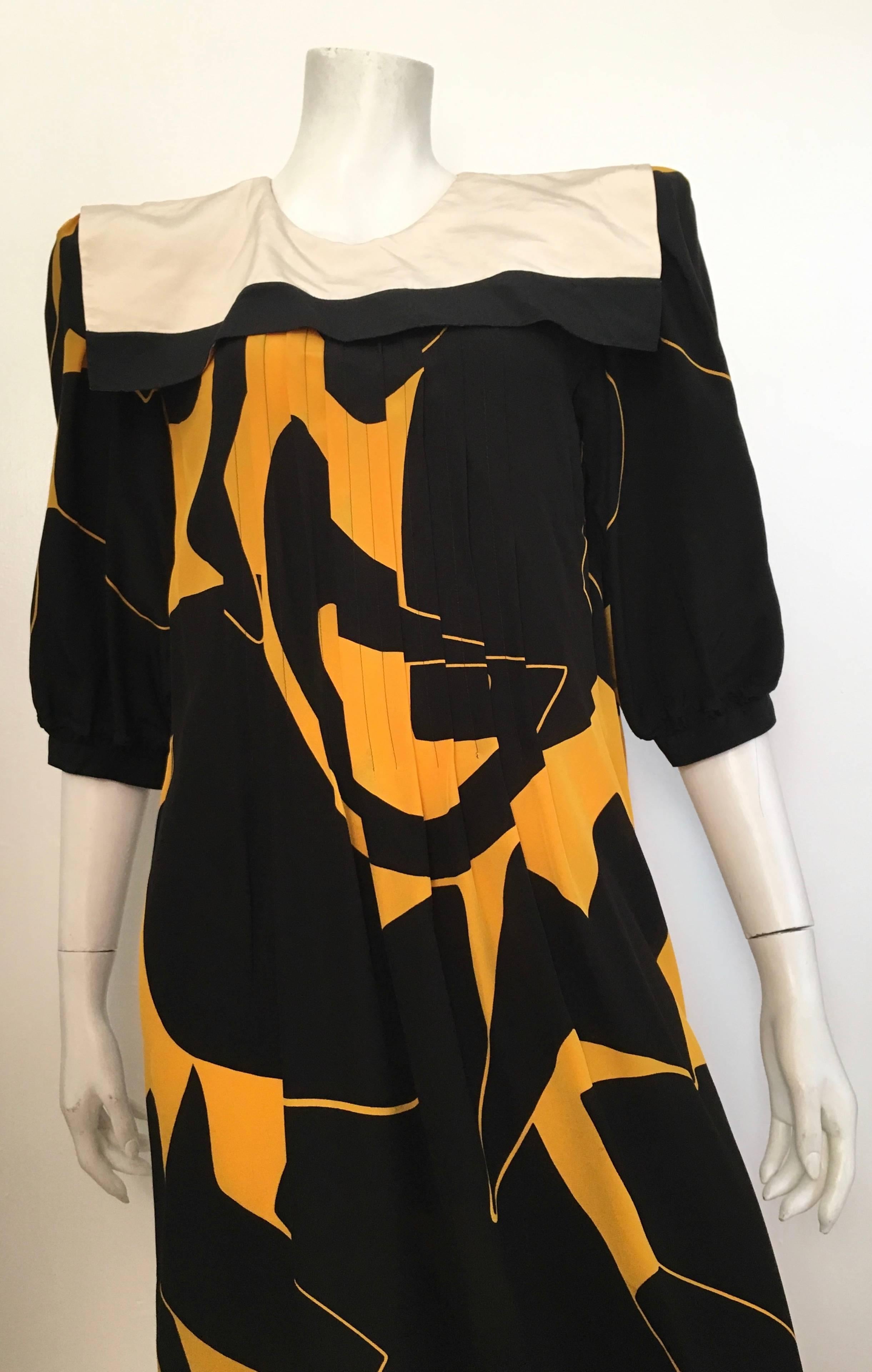 Flora Kung Advance silk with fantastic abstract pattern design dress with sailor collar is a size 10. Gorgeous pattern that is perfect for an art opening or dinner at The Four Seasons. Shoulder pads that can be removed is so desired.
Measurements