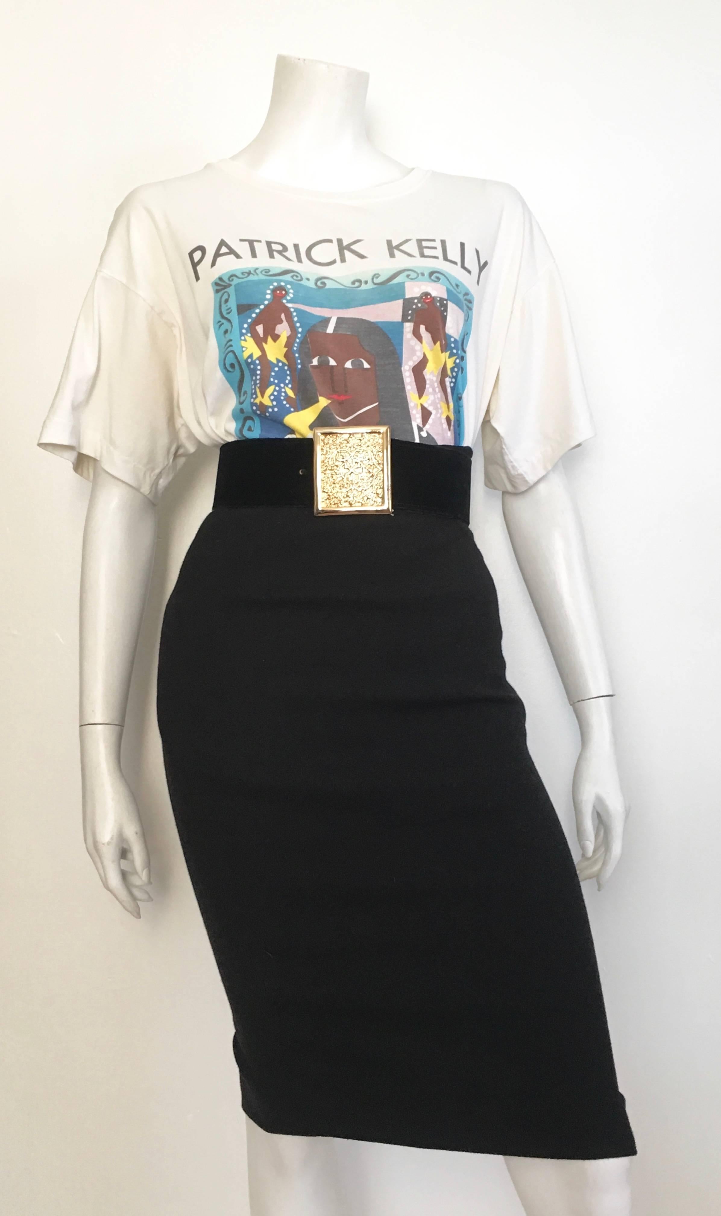 Ralph Lauren Collection Purple Label black wool pencil skirt is a size 2 but will fit a size 4 as well. The waist is 28" so that should fit a size 4 but you decide. Matilda the Mannequin is a size 4 and this fits her beautifully.  Ladies please