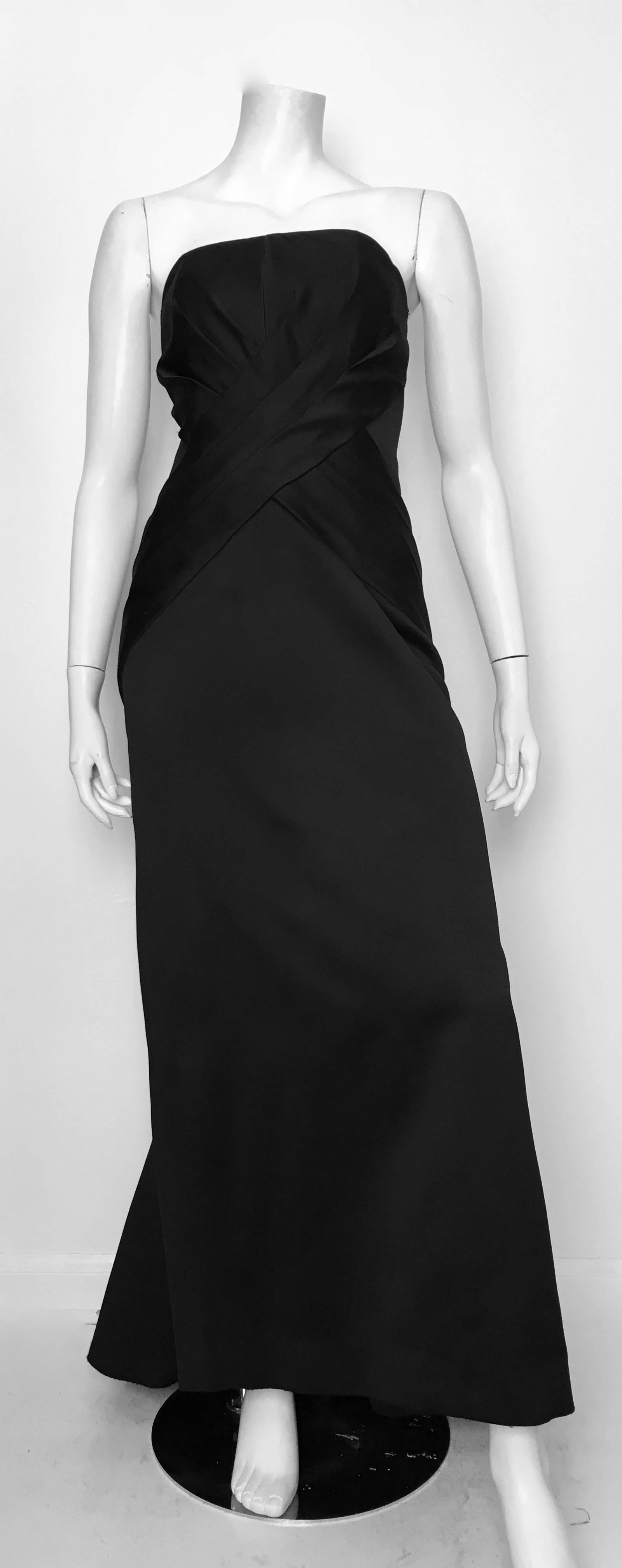 Victor Costa for Bergdorf Goodman 1980s black strapless red carpet gown is a size 4.  This fits Matilda the Mannequin perfectly so if you have the body type like Matilda then this gown is for you. Ladies please grab your trusted friend, Mr. Tape