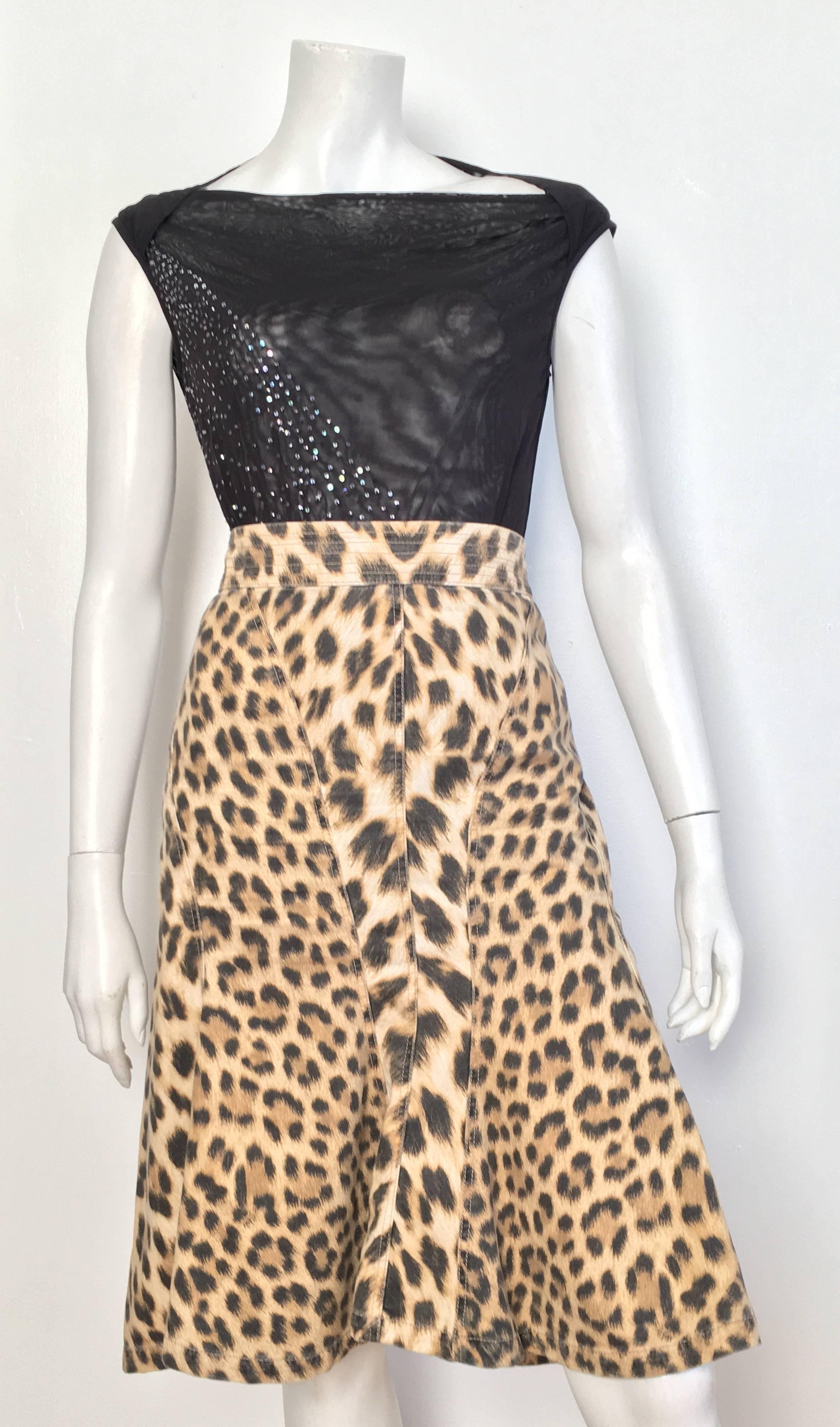 Roberto Cavalli cotton leopard print skirt is an Italian size 46 and fits like an USA size 10. The waist on this skirt is 35.3/4" so ladies please use your tape measure to make certain this size will fit your lovely body. This skirt is made in