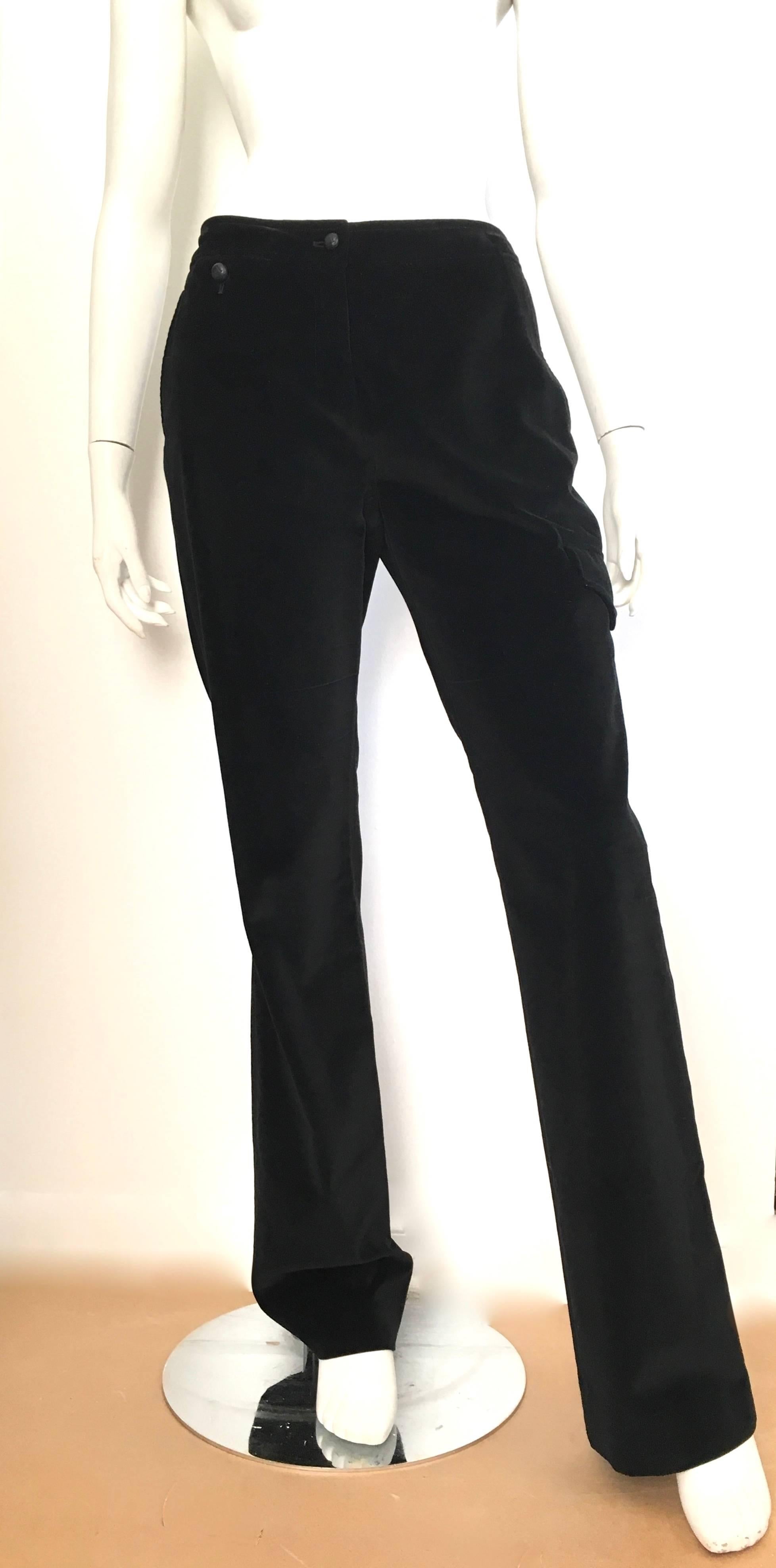 Yves Saint Laurent Rive Gauche black velvet cargo pants with pockets is a French size 38 and will fit an USA size 6.  Gorgeous contemporary velvet cargo pants with black leather buttons. These pants are not lined.  Wear your vintage YSL tuxedo