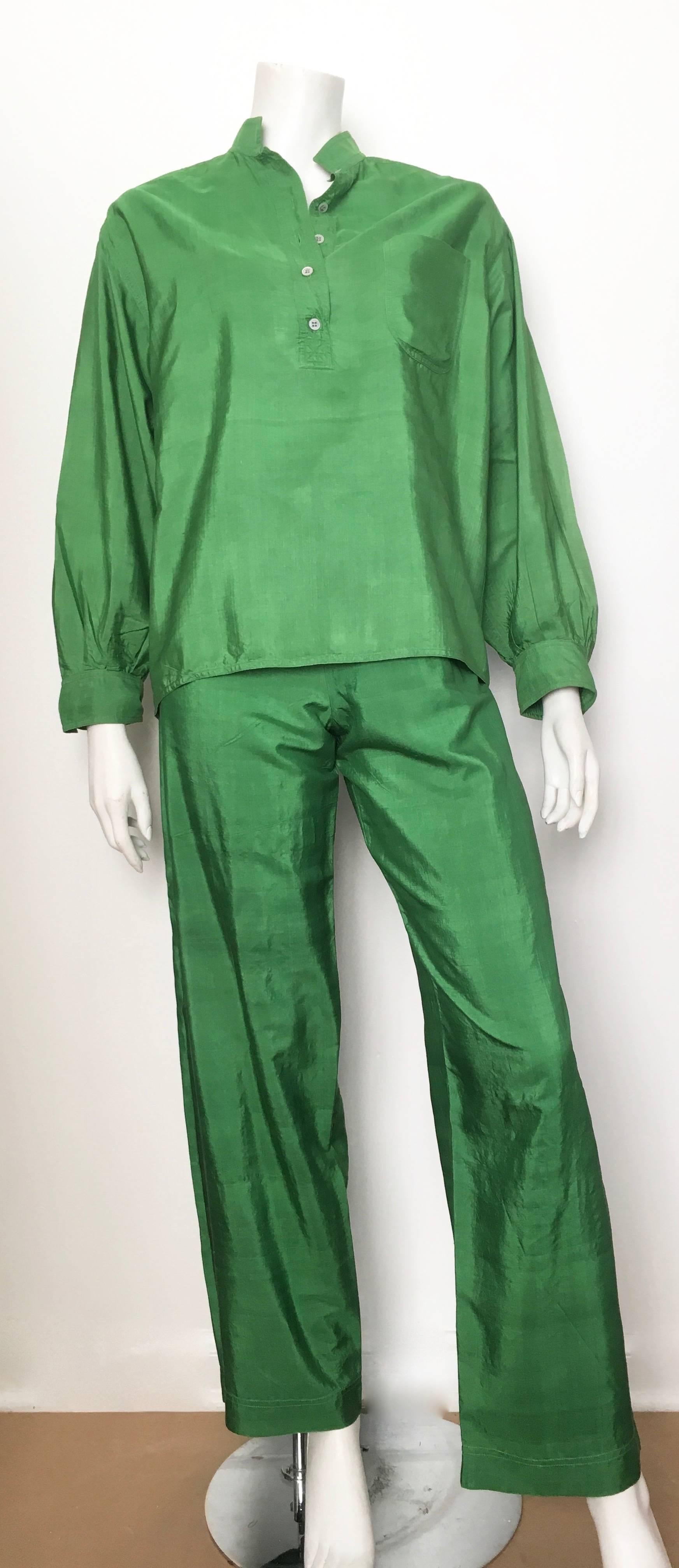Saint Laurent Rive Gauche 1978-1979 green flowing blouse, pants and 2 sashes ( orange & pink).  The flowing blouse is a French size 40 and fits an USA size 8 and the pants with elastic waistband is a French size 36 and will fit an USA size 4. There