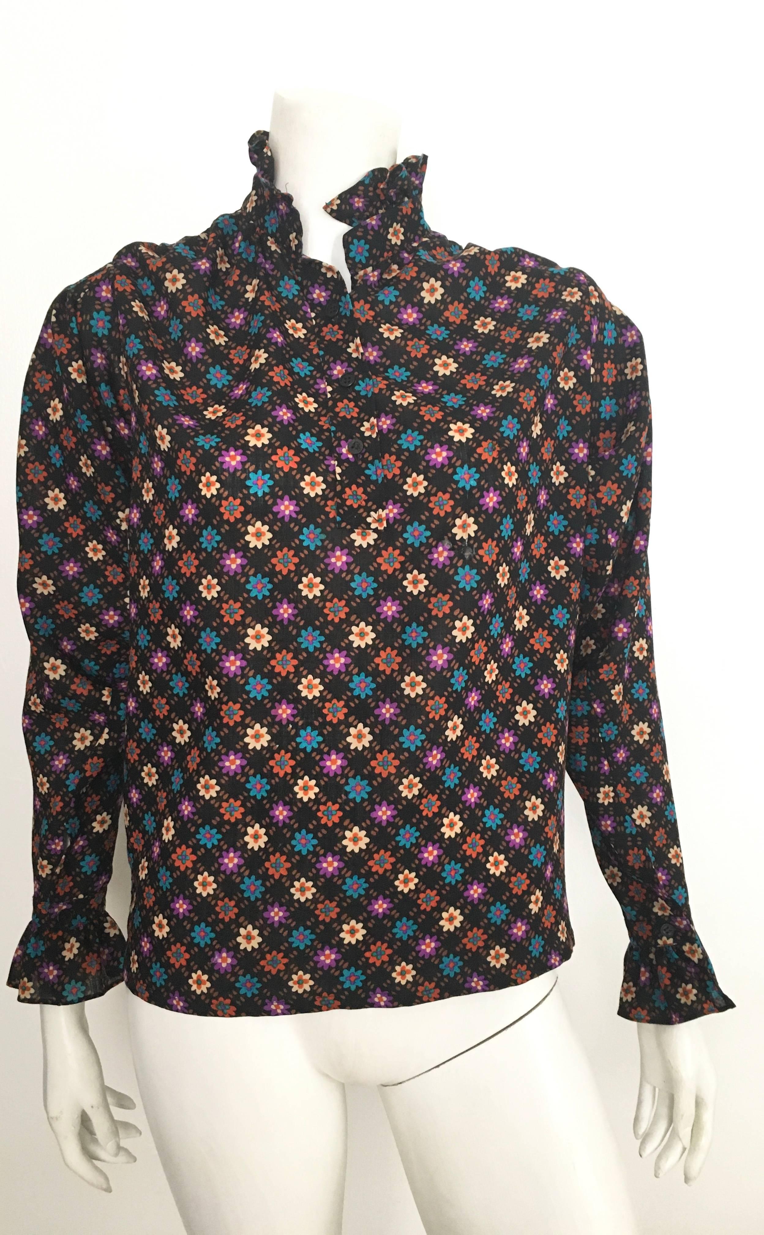 Yves Saint Laurent Rive Gauche 1976 Russian collection peasant long sleeve blouse is a French size 34 and fits a size 4.  This jaw dropping simply stunning flower print blouse is not only a rare gem but an exquisite piece of fashion history.  This