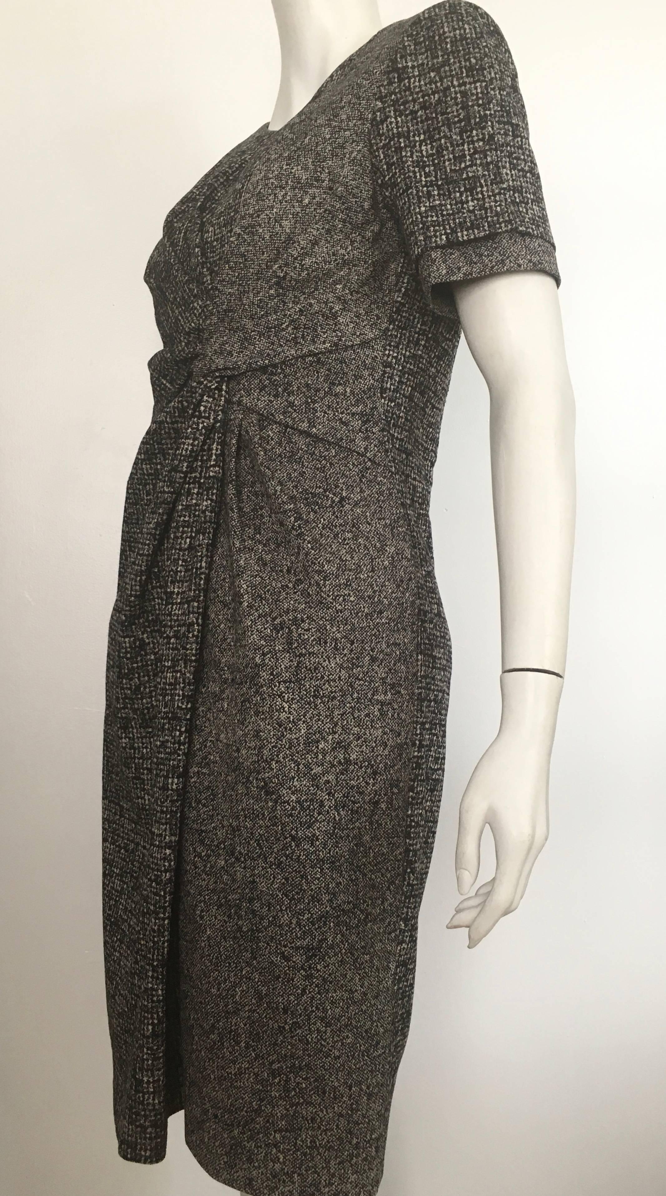 Paule Ka cotton black & grey short sleeve casual dress is a size 42 and fits like an USA size 10 / 12.  The waist is 34