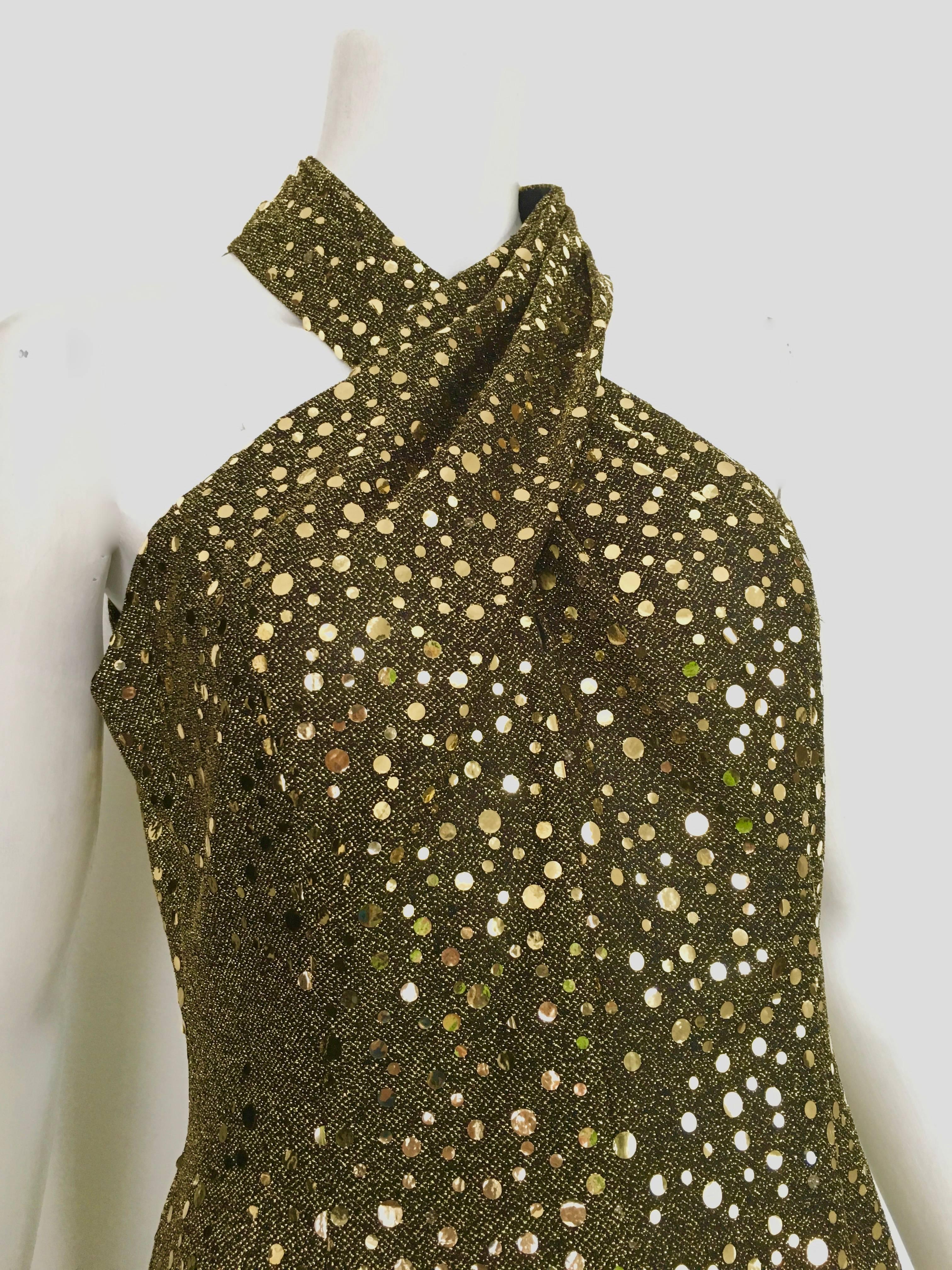 Morton Myles 1980s gold sequin evening cocktail sleeveless dress is labeled a size 10 but fits like a size 6.  The waist on this dress is 30