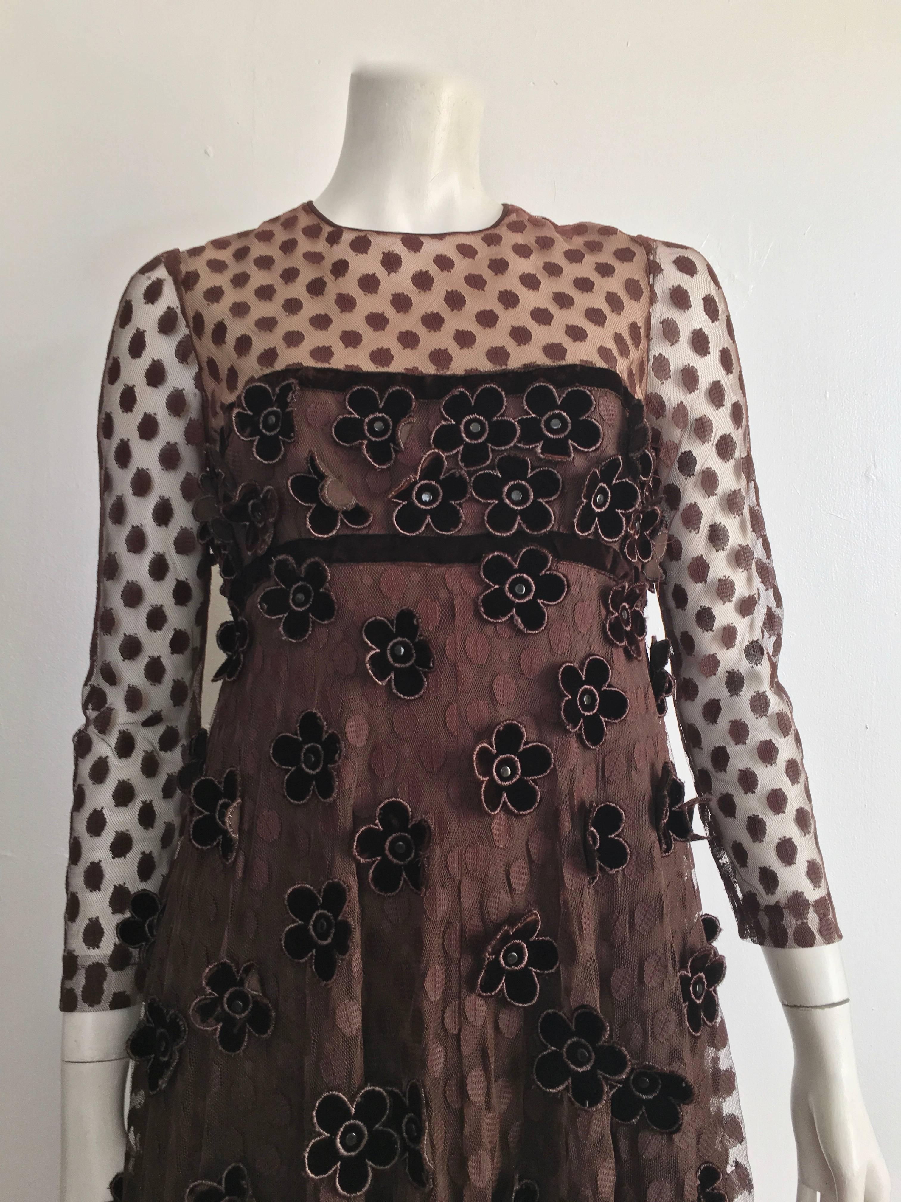 Gorgeous unknown designer 1960s chocolate brown tulle layered empire waist dress with velvet flowers maxi dress is a size 8 / 10.  The waist on this maxi dress is 32