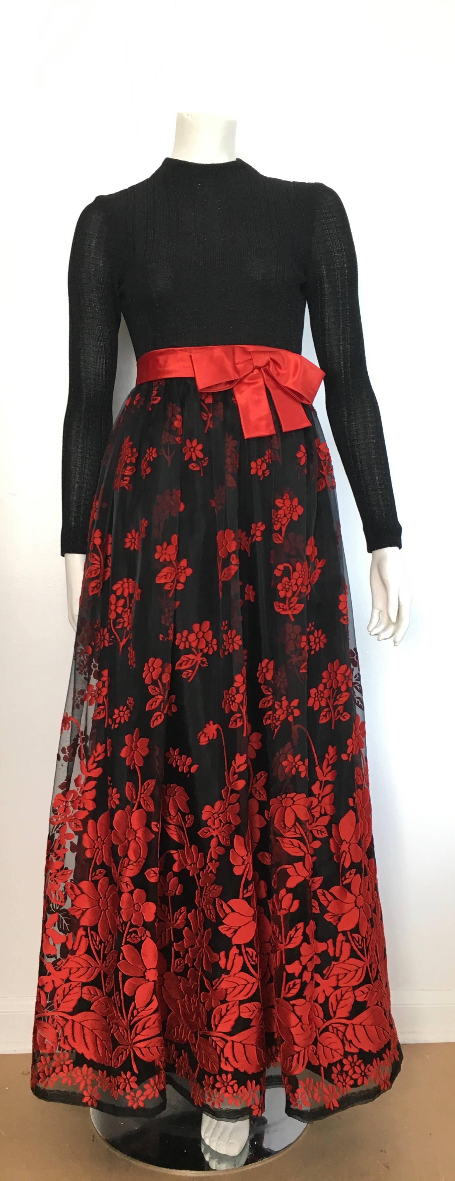 Huey Waltzer 1970s black knit long sleeves maxi evening dress is a size 4.  The waist on this evening maxi dress is 25