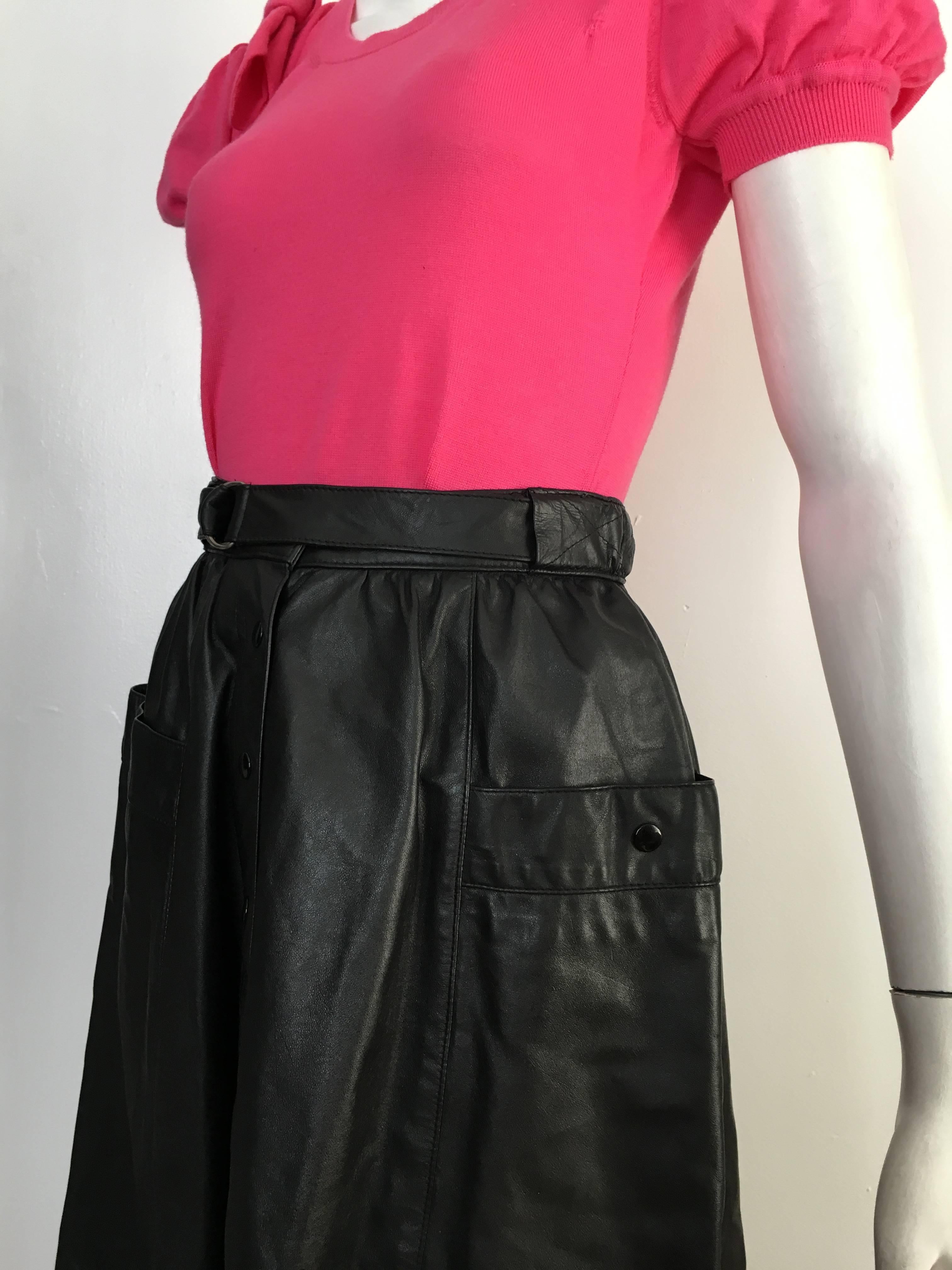 Saks Fifth Avenue 1980s Black Leather A Line Skirt with Pockets Size 4.  For Sale 13