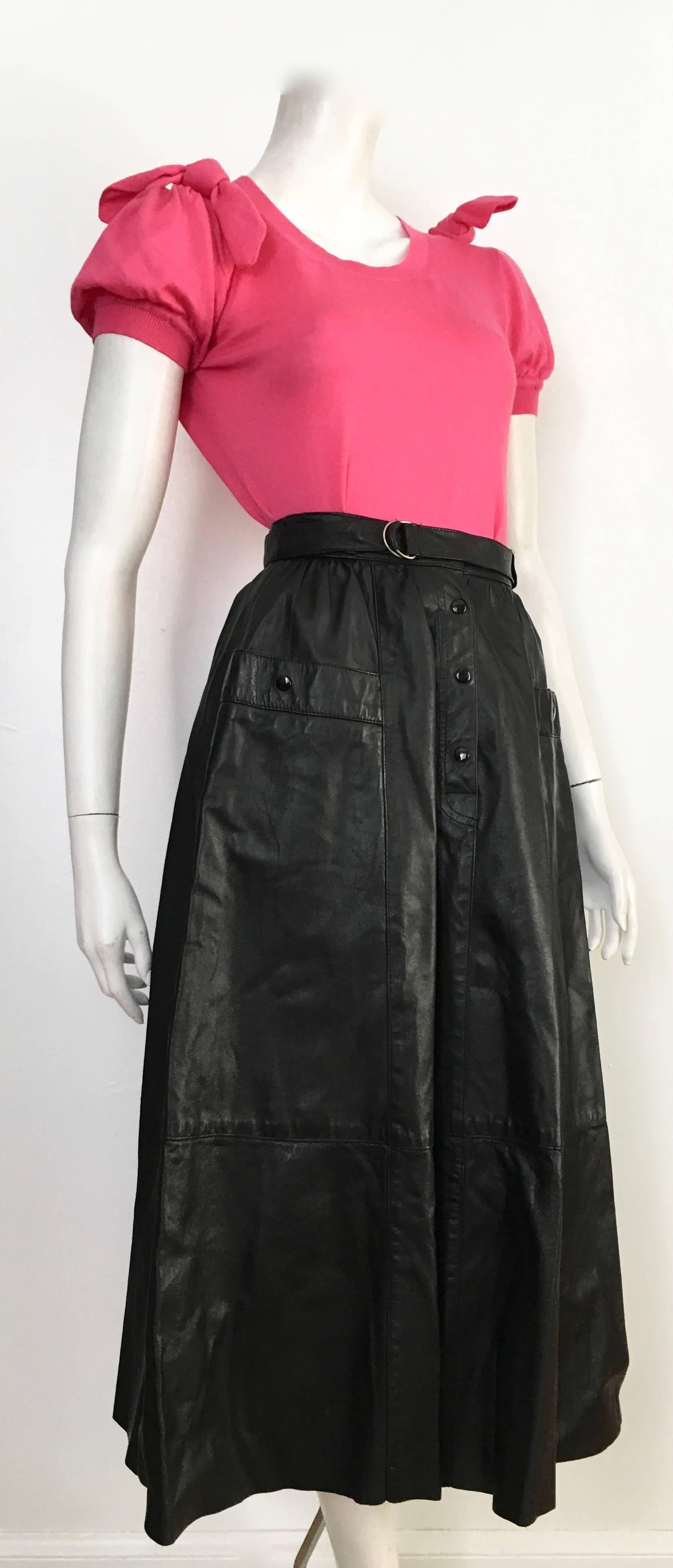 Saks Fifth Avenue 1980s Black Leather A Line Skirt with Pockets Size 4.  For Sale 14