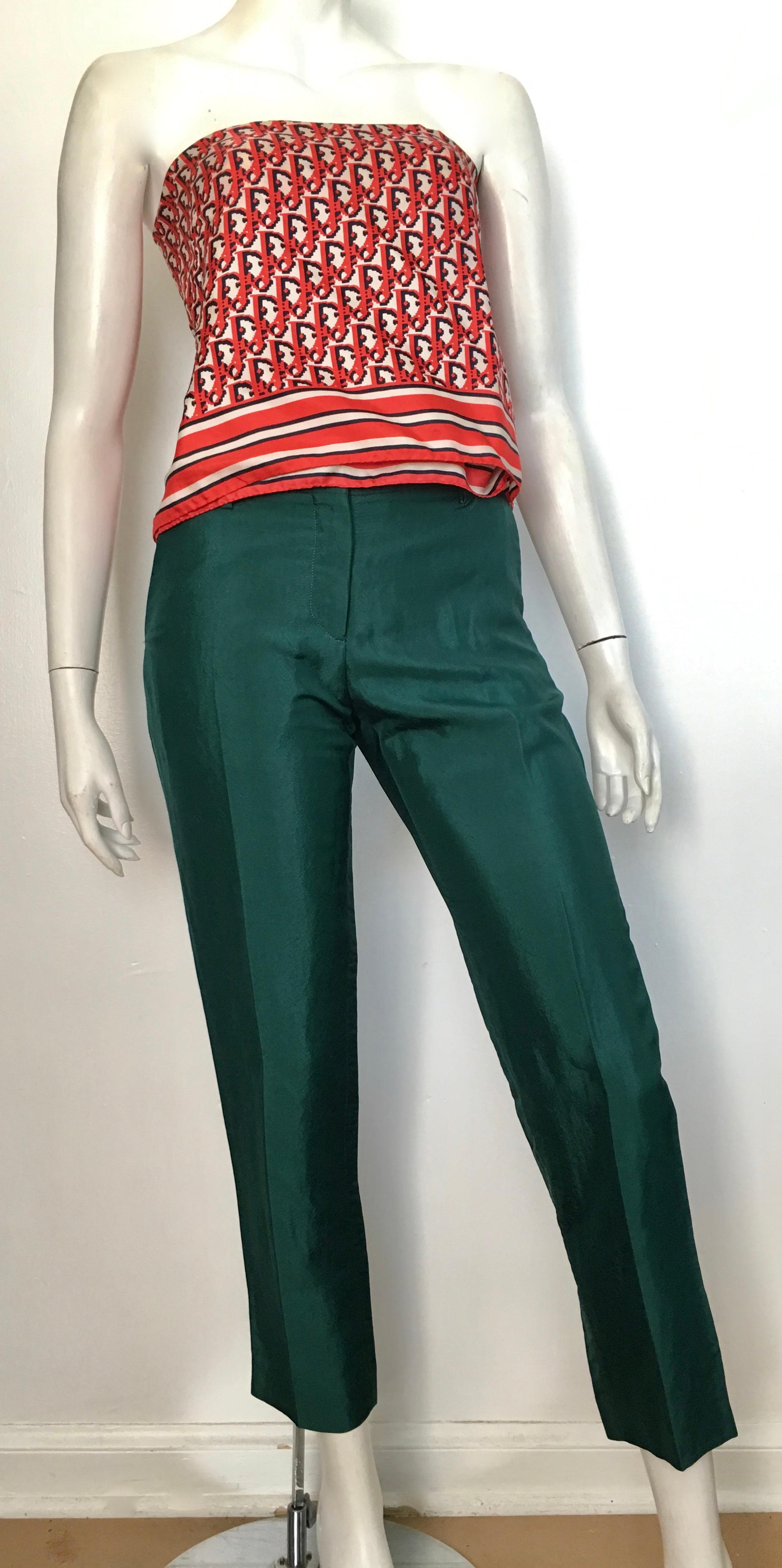 Dries Van Noten green dress pants with pockets are a size 34 and fit like a size 4.  The waist on these pants are 30. 1/2