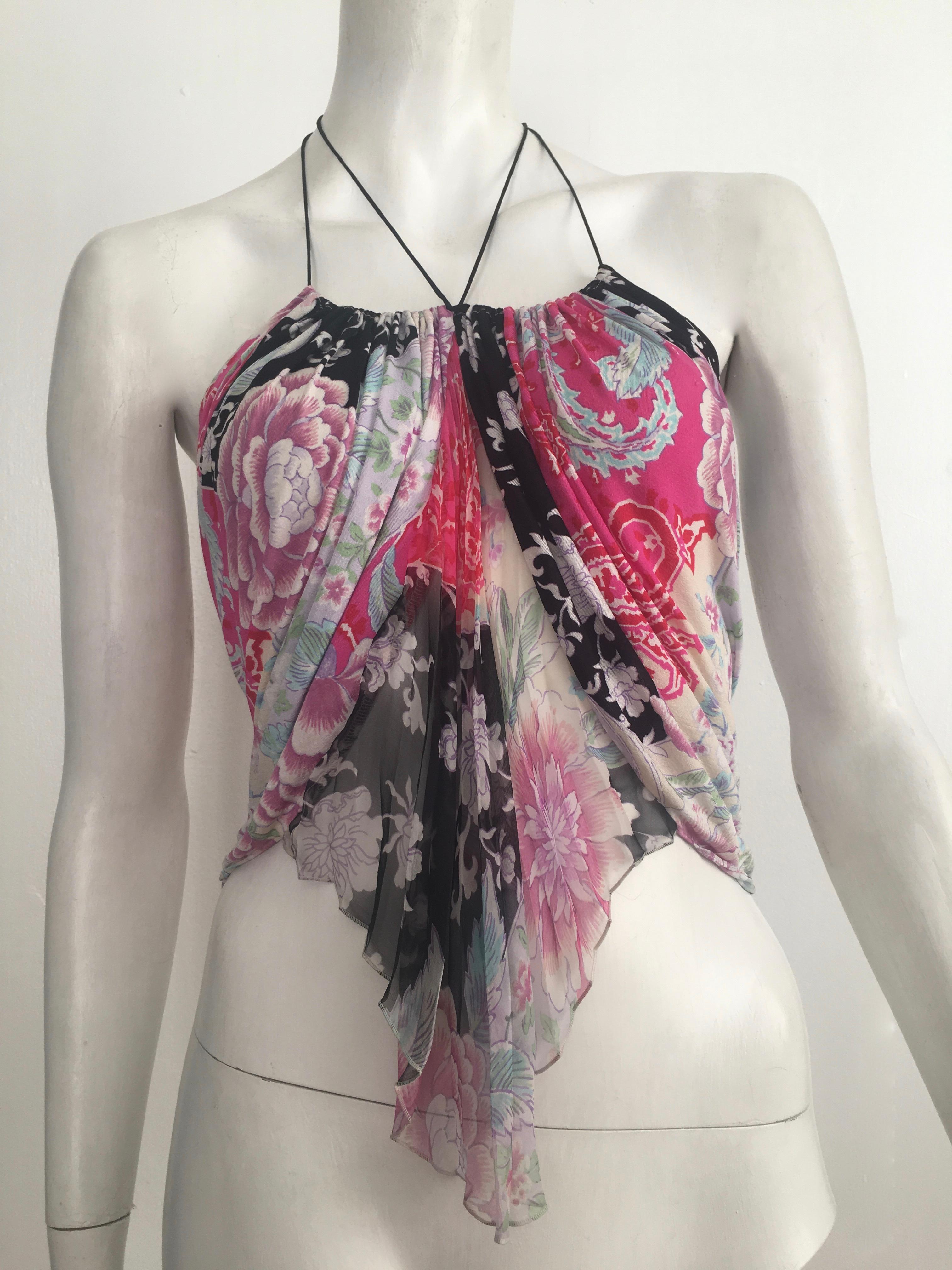 Emanuel Ungaro 1990s silk floral sexy camisole is a size 4.  This fits Matilda the Mannequin, who wears a size 4, beautifully. This is a gorgeous top that can be worn with your Thierry Mugler skirt or your Lanvin pants.  Wear it with or without a