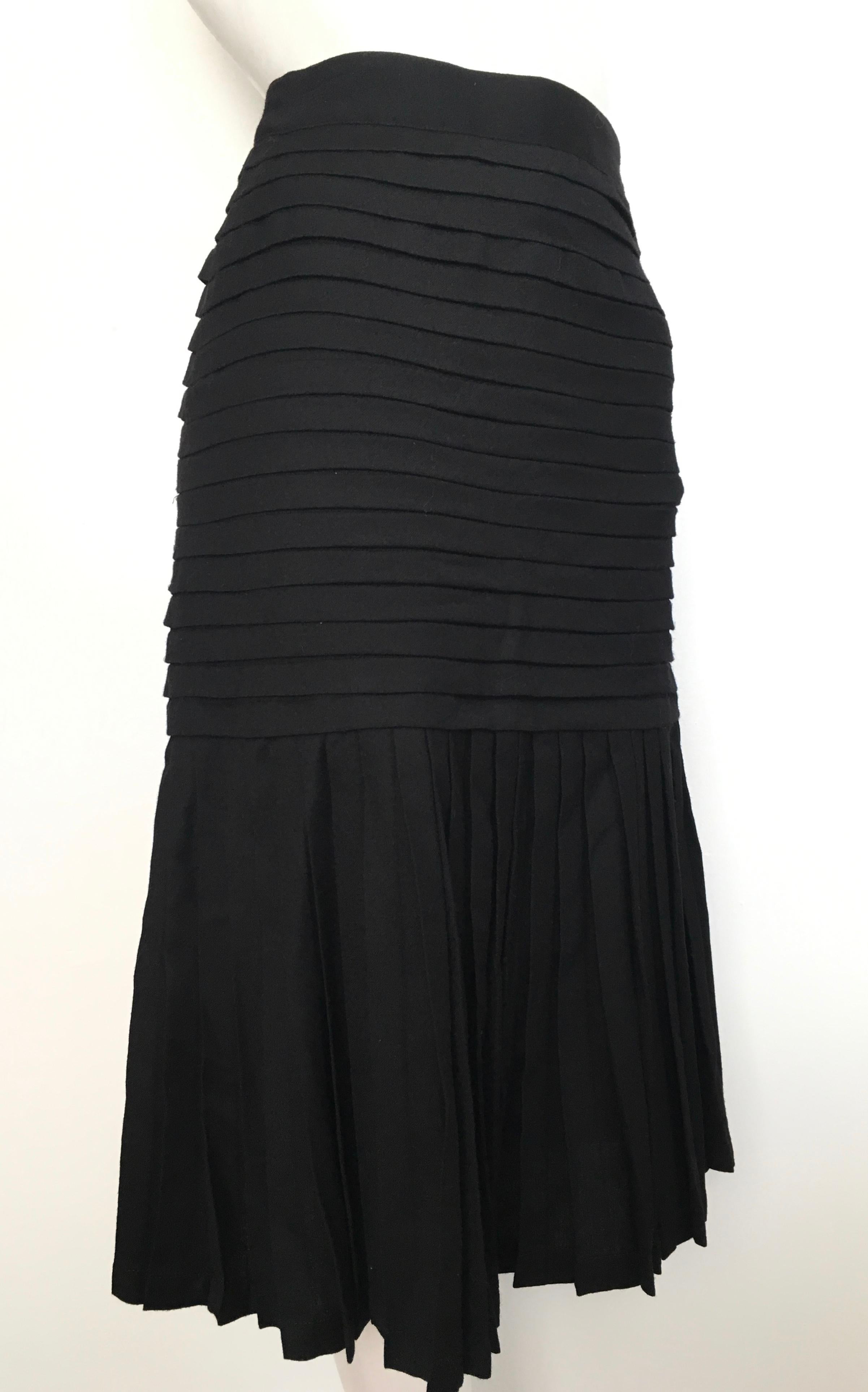 Women's or Men's Genny Black Wool Pleated Skirt Size 6. For Sale