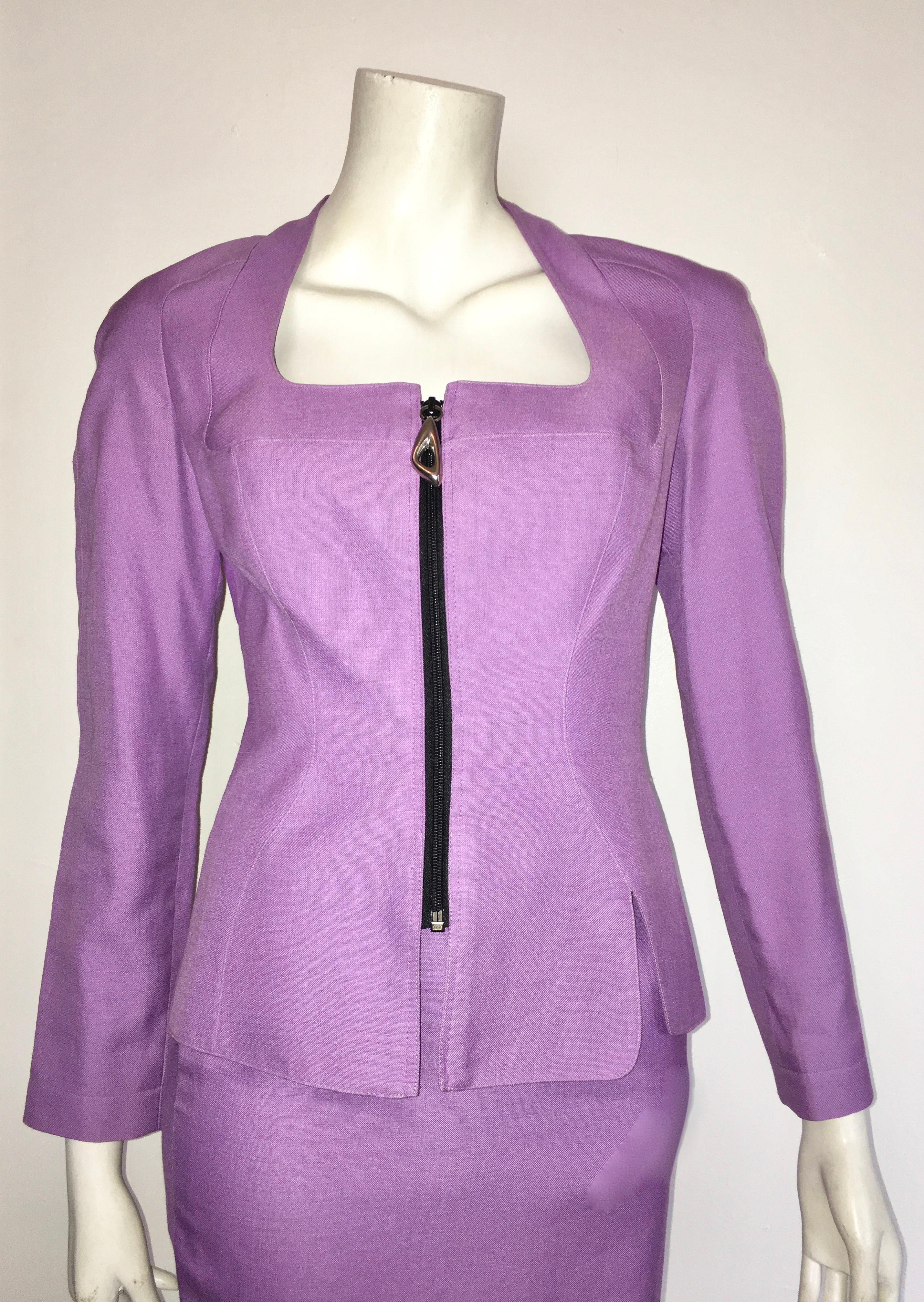 Thierry Mugler 1990s lilac zipper jacket with matching pencil skirt is a French size 36 and a USA size 4.  The waist on the skirt is 25