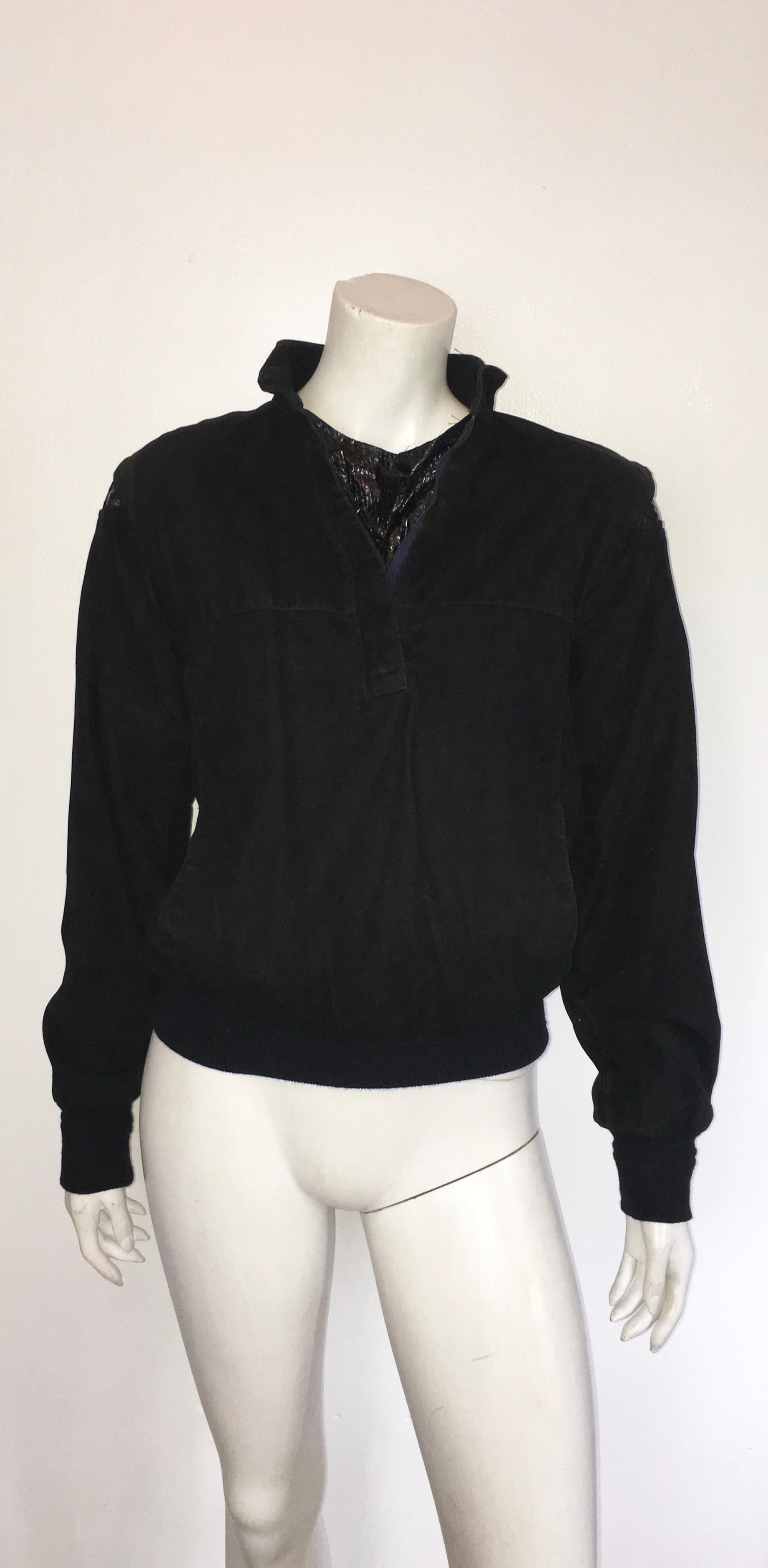 Valentino 1980s black faux suede with faux snakeskin trim zipper pullover jacket is an Italian size 46 and fits like an USA size 8.  There is no fabric content label inside this lined jacket.  It feels like a brushed ultra suede fabric but my guess