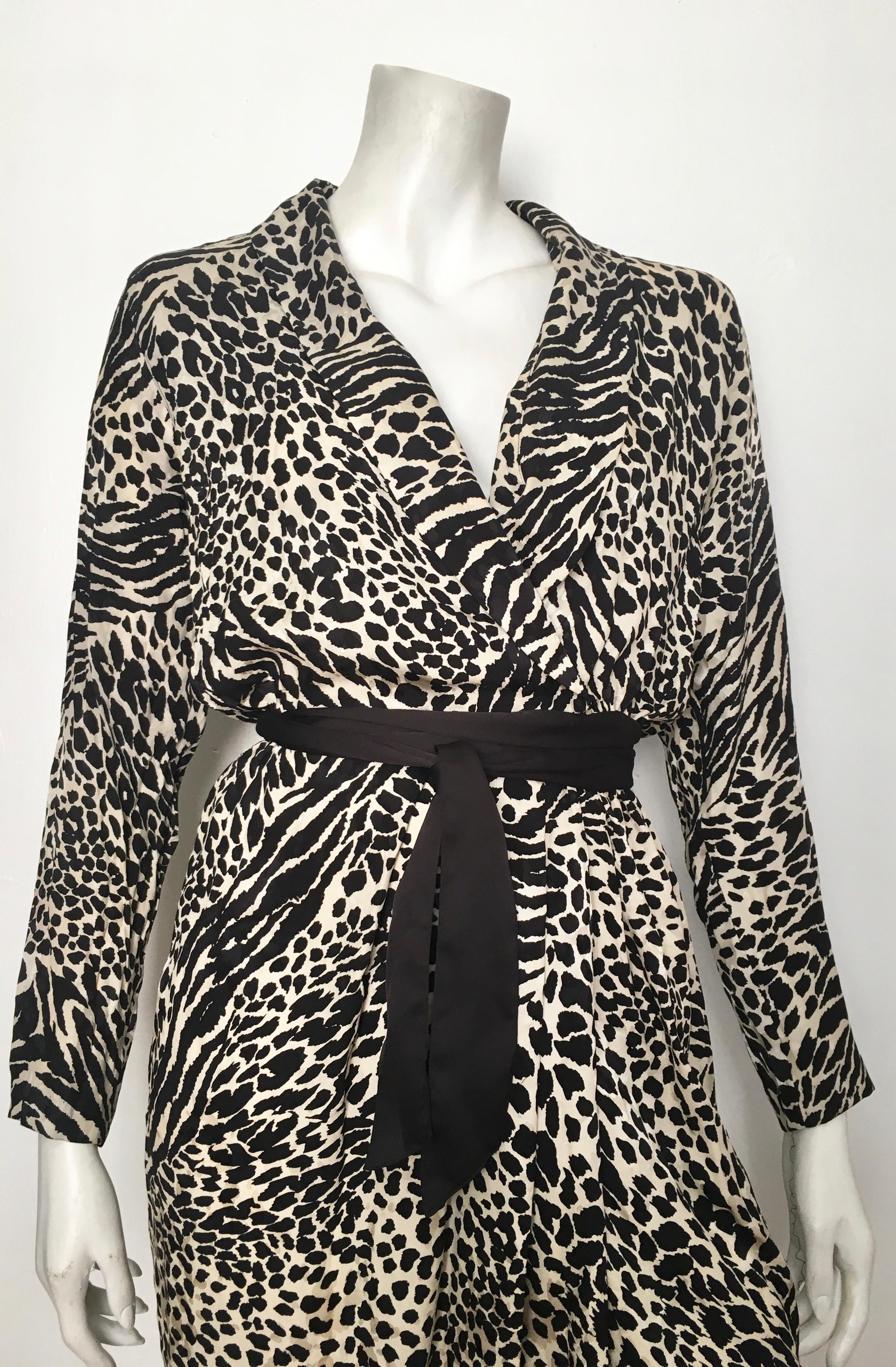Geoffrey Beene for Lillie Rubin 1980 animal print silk dress with belt is a size 6.  The waist on this dress is 25