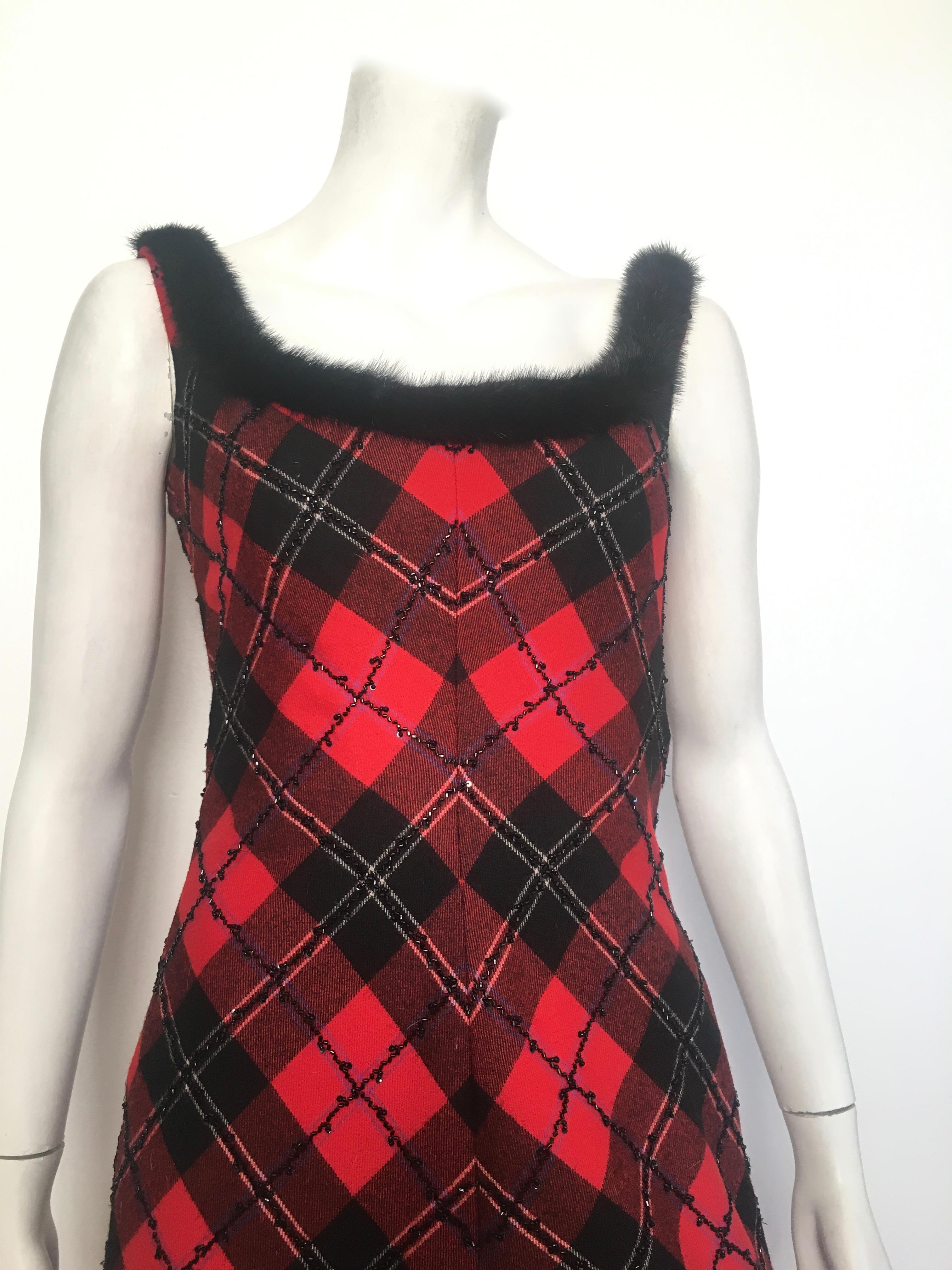 Bellville Sassoon Lorcan Mullany sleeveless plaid wool beaded with mink trim neckline is labeled a size 10 but fits like a size 4.  Matilda the Mannequin is a size 4 and this dress fits perfectly so ladies please grab your tape measure so you can