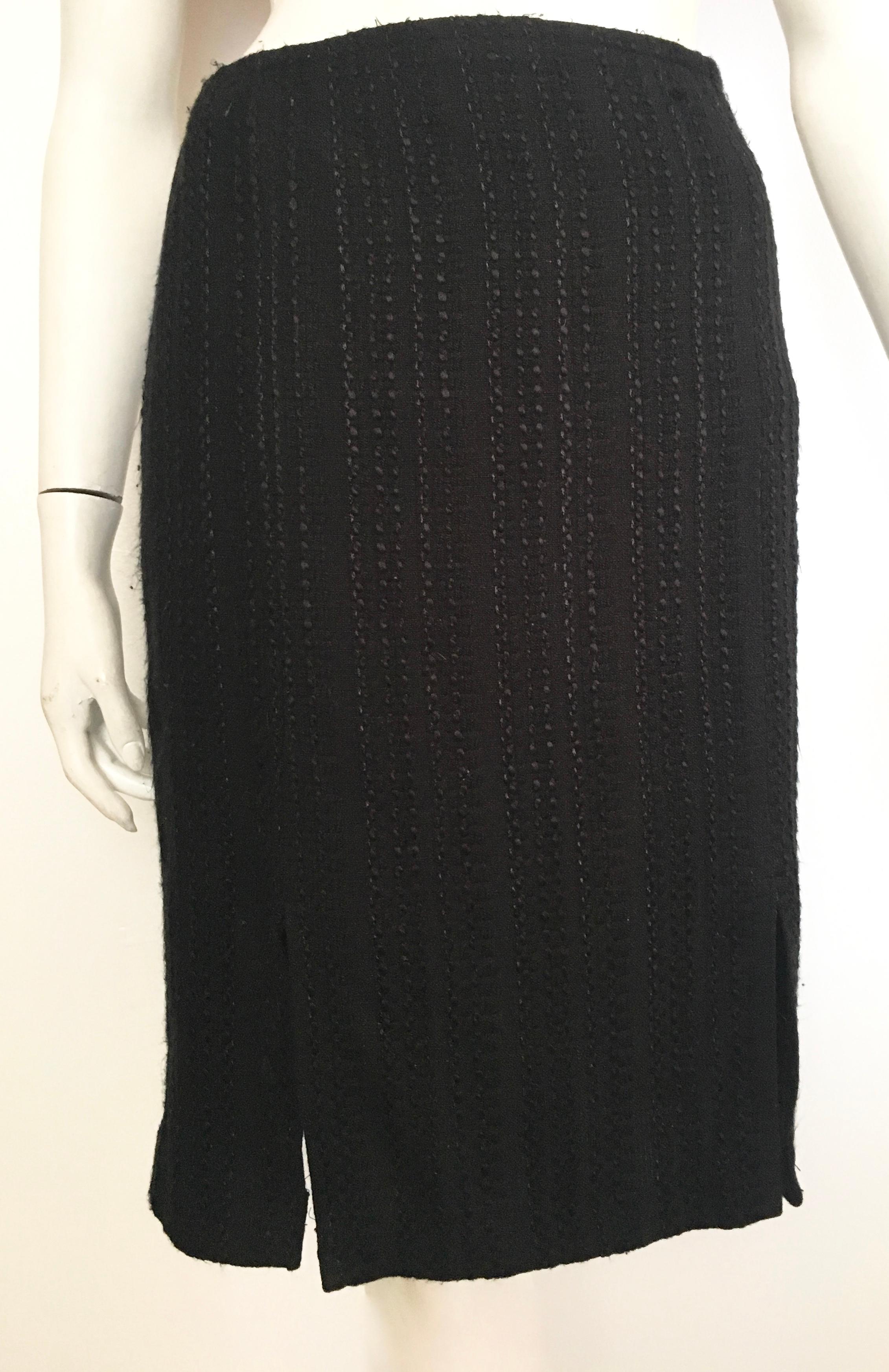 Pierre Cardin 1990s black skirt size 6. 
Classic skirt that is perfect for the office, the grocery store, mall shopping or funerals. 
It will be your 'go to' skirt for just about any occasion.
Skirt is lined.
Measurements are:
29. 1/2