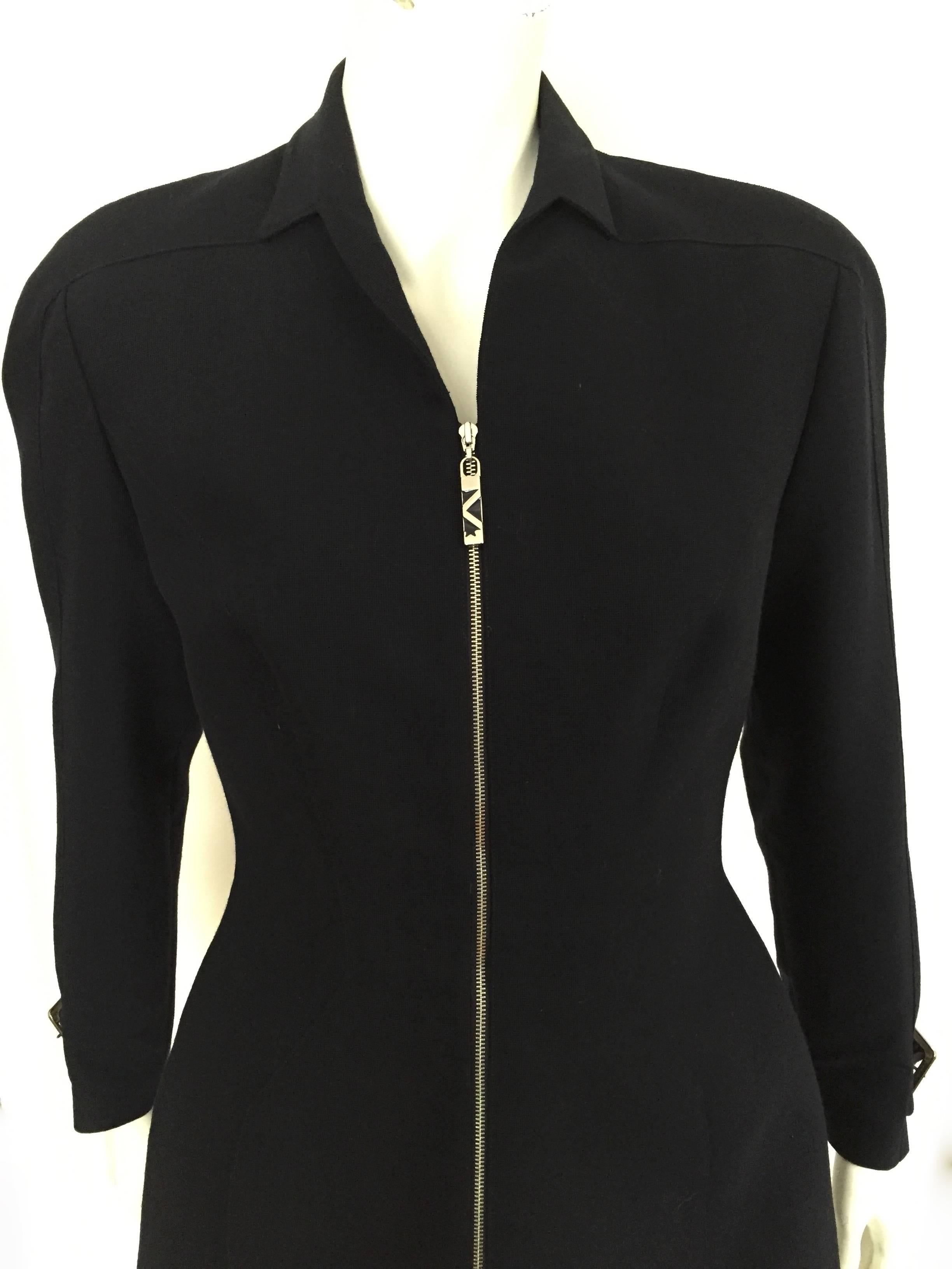 Thierry Mugler 1990s navy wool super constructed zipper jacket is a French size 42 but fits like a USA size 10.  Please see & use the measurements I provide you with so that this treasure will make you look like a million dollars. Sharp angular