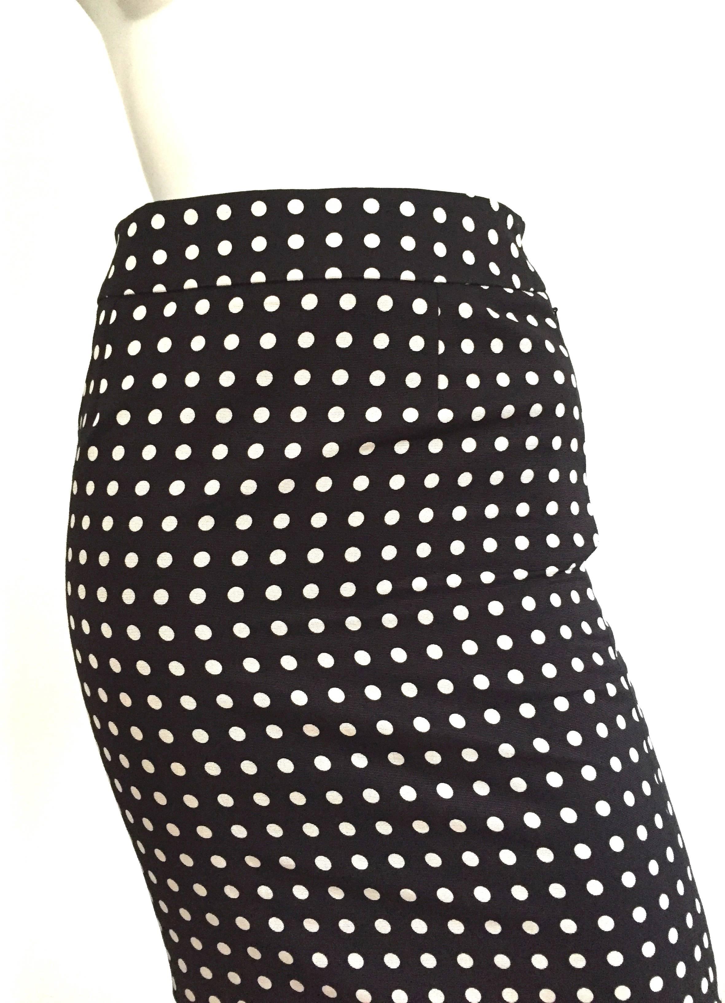 Yves Saint Laurent Rive Gauche polka dot skirt size 4.  Please see & use measurements to properly measure your waist and hips so that this piece will fit your to perfection. The mannequin is a size 4 and this YSL skirt was a very tight fit. Skirt is