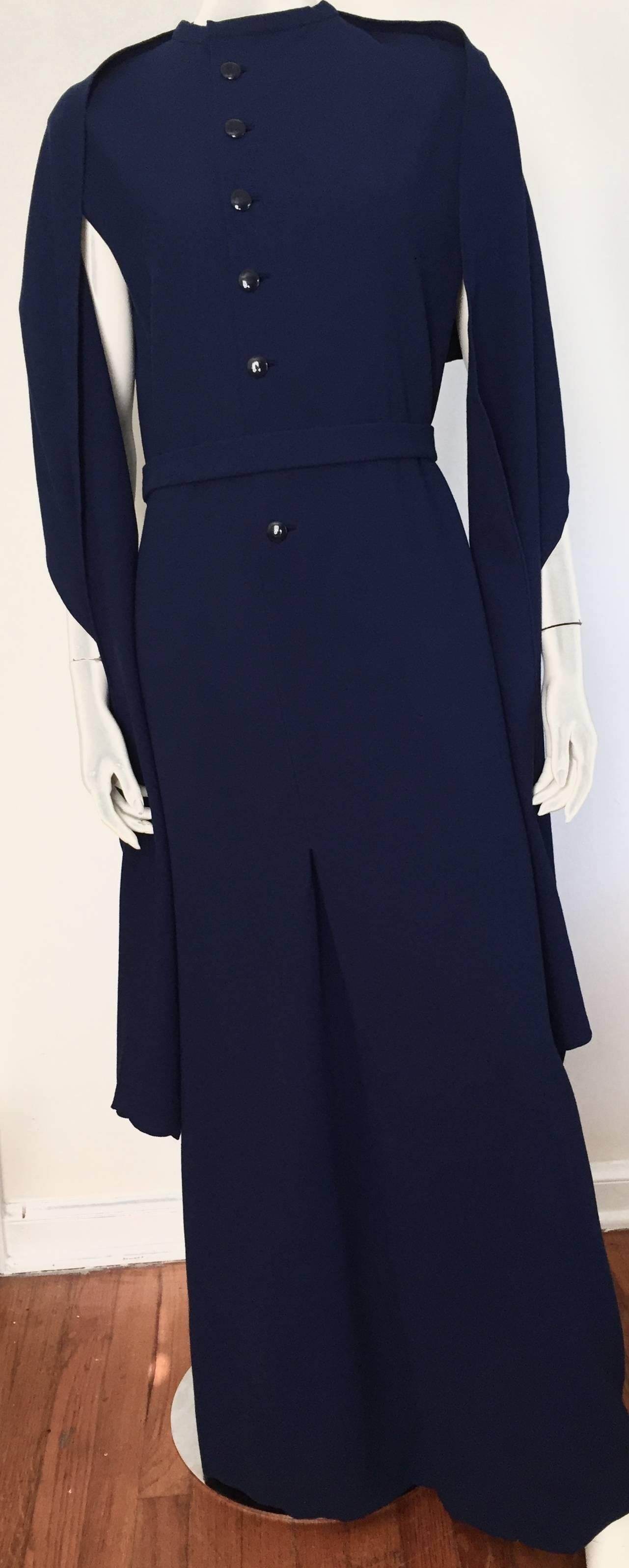 Pauline Trigere early 1970s navy wool long dress with belt and matching shawl is a size large but will fit size 12 / 14 but please see & use the measurements below so that you can properly measure your body so that this vintage treasure will fit you