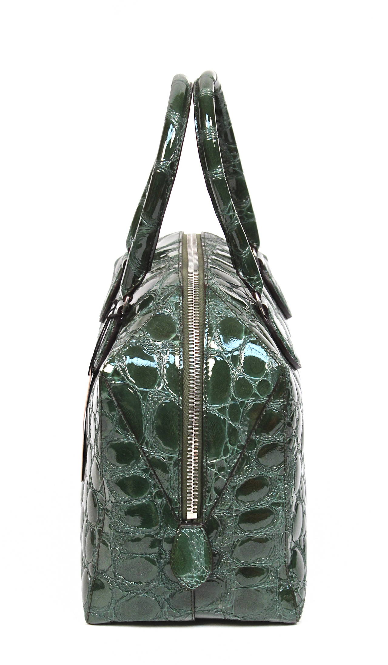 Unusual green crocodile embossed patent leather bag with silver toned hardware from Azzedine Alaia. Approximate measurements are:  13