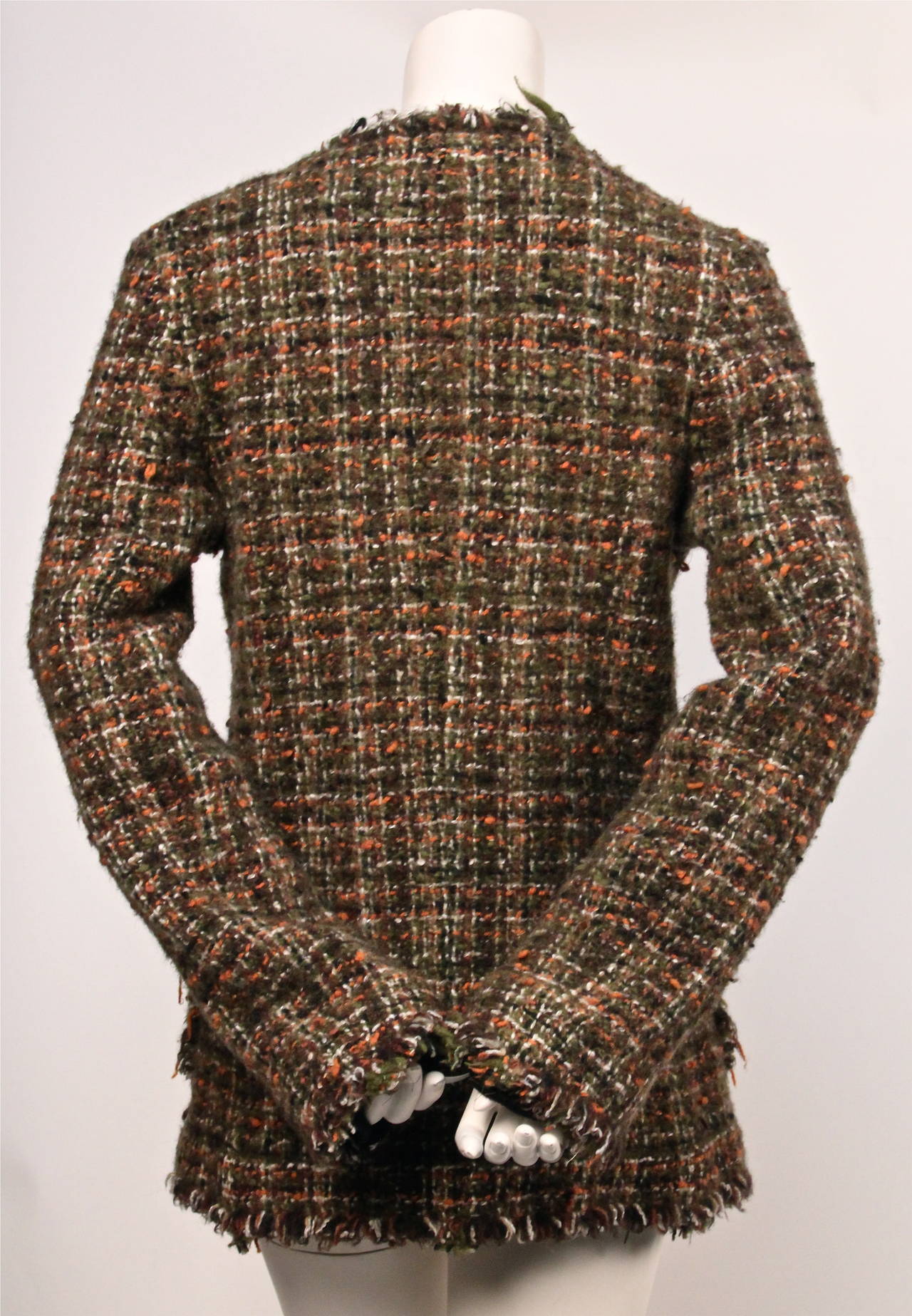 Brown, orange and moss tweed coat with raw edges from Junya Watanabe as seen on the runway Fall 2003. Size M. Approximate measurements are as follows: shoulder 16