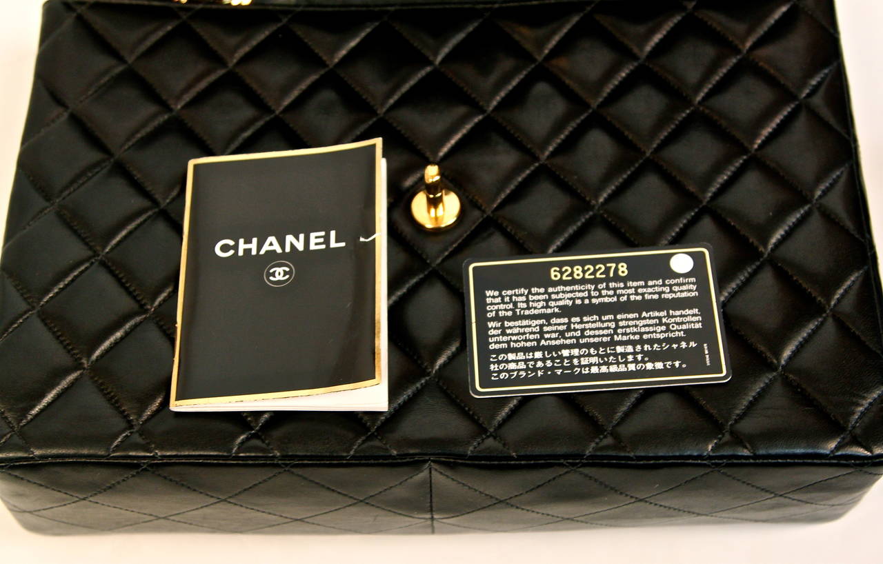 CHANEL black jumbo flap bag with woven leather & gilt metal chain strap 3