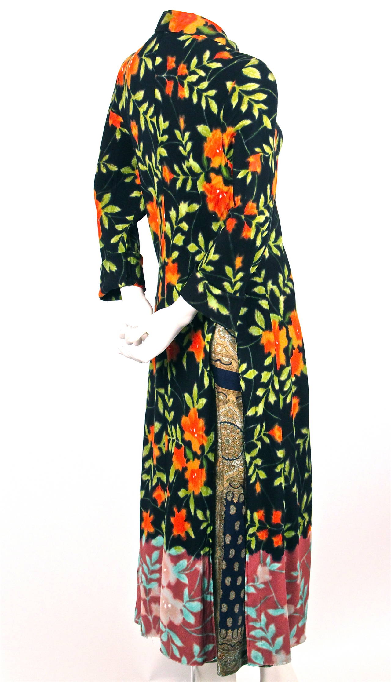 Long floral jacket with adjustable hook/eye closures and long button front skirt in contrasting fabric from Comme des Garcons dating to spring of 1993. Pieces can also be worn as separates. Size M. Best fits a US 4-6. Skirt has a 26