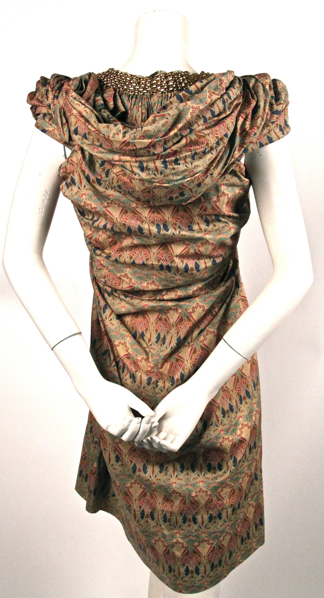 Brown JUNYA WATANABE floral runway dress with gold chain collar and hood