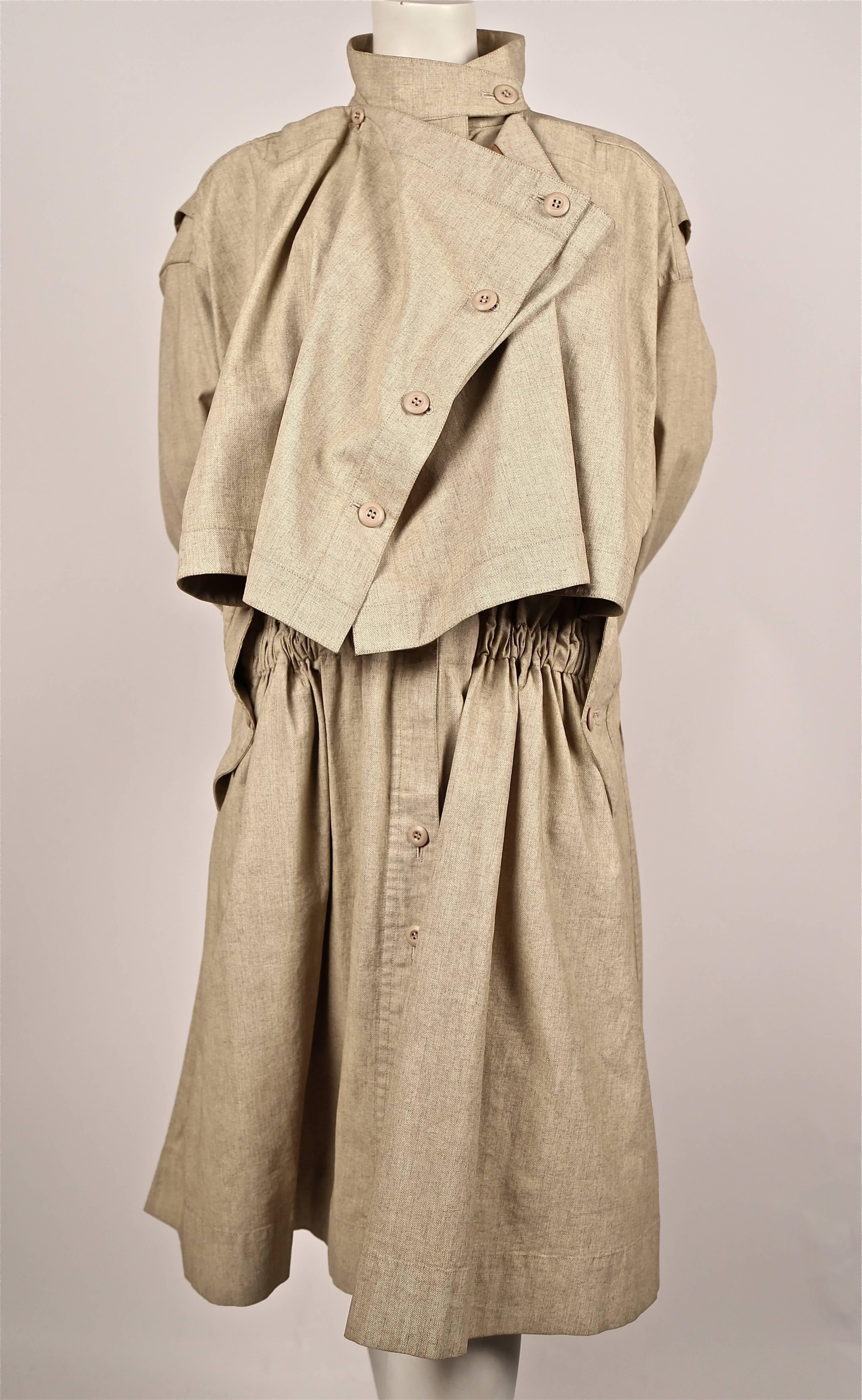 Very rare 1980's tan oversized draped coat from Issey Miyake dating to the 1980's.  Can be worn a number of ways. No size indicated however this coat will fit many sizes due to the oversized cut. Length is approximately 45