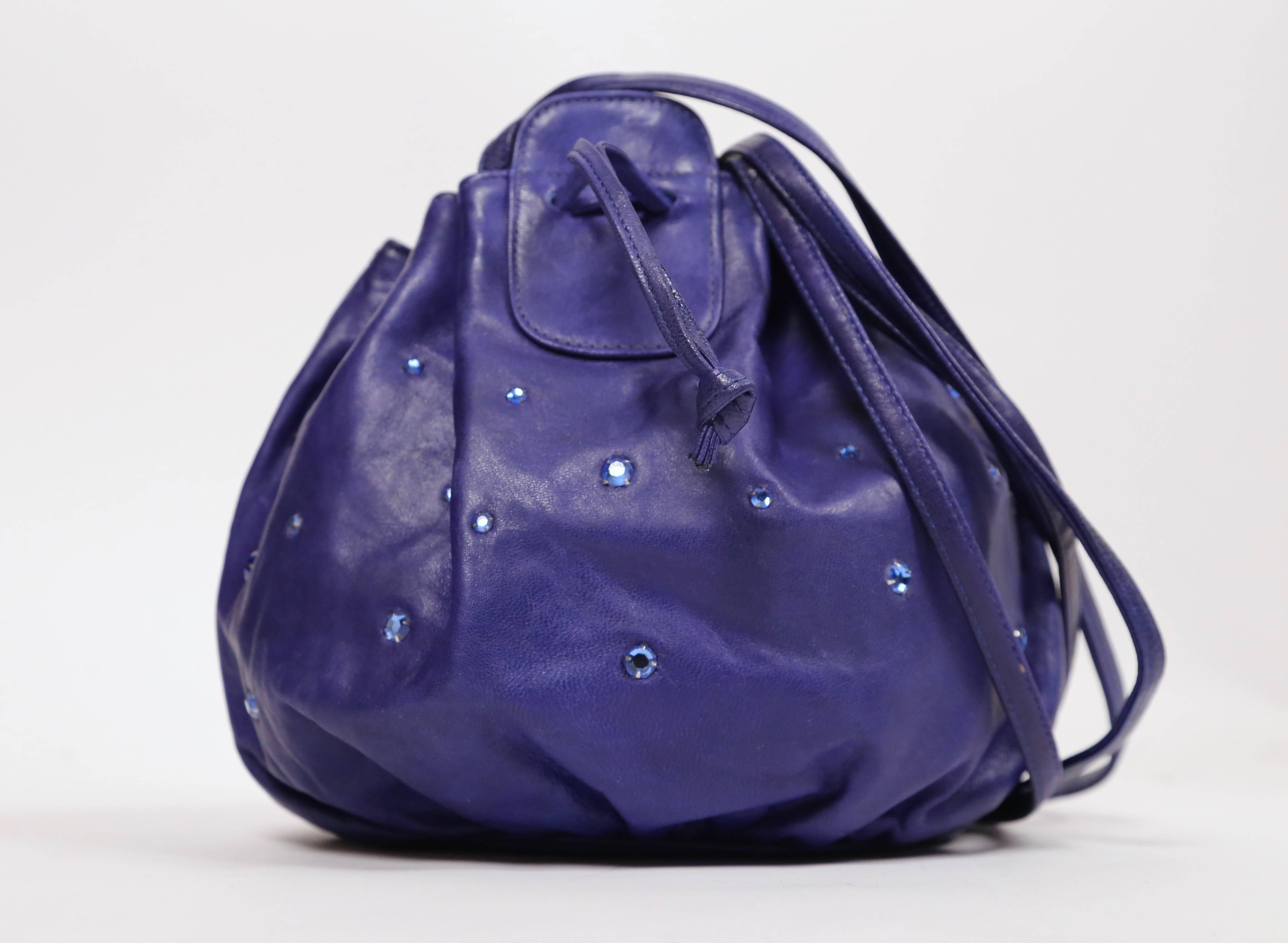 Vivid royal blue leather bucket bag with rhinestones from Halston dating to the late 1970's. Bag measures approximately 7