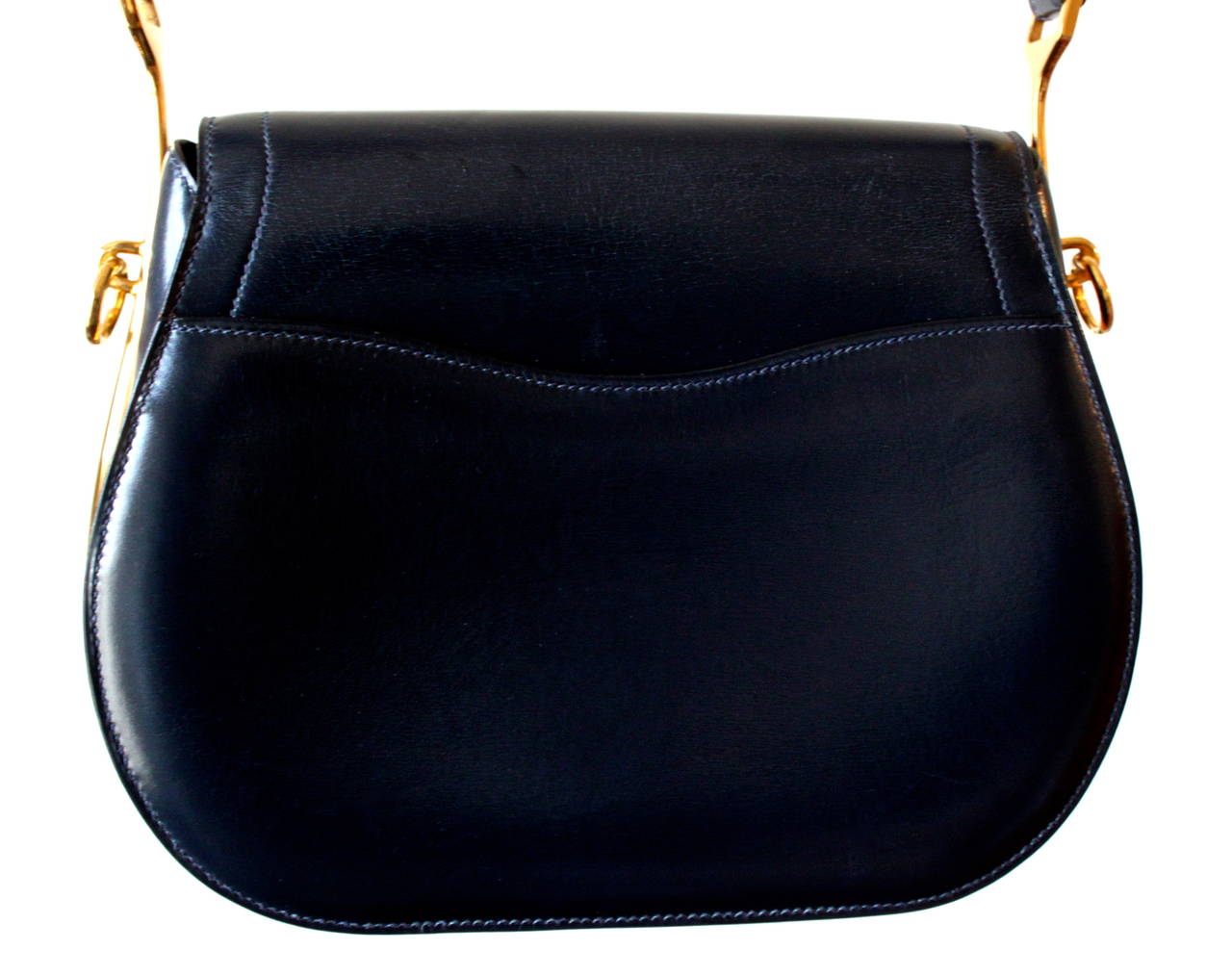 Very rare navy blue leather Passe-Guide bagwith gilt hardware designed by Hermes. Measures approximately: 28 cm (11
