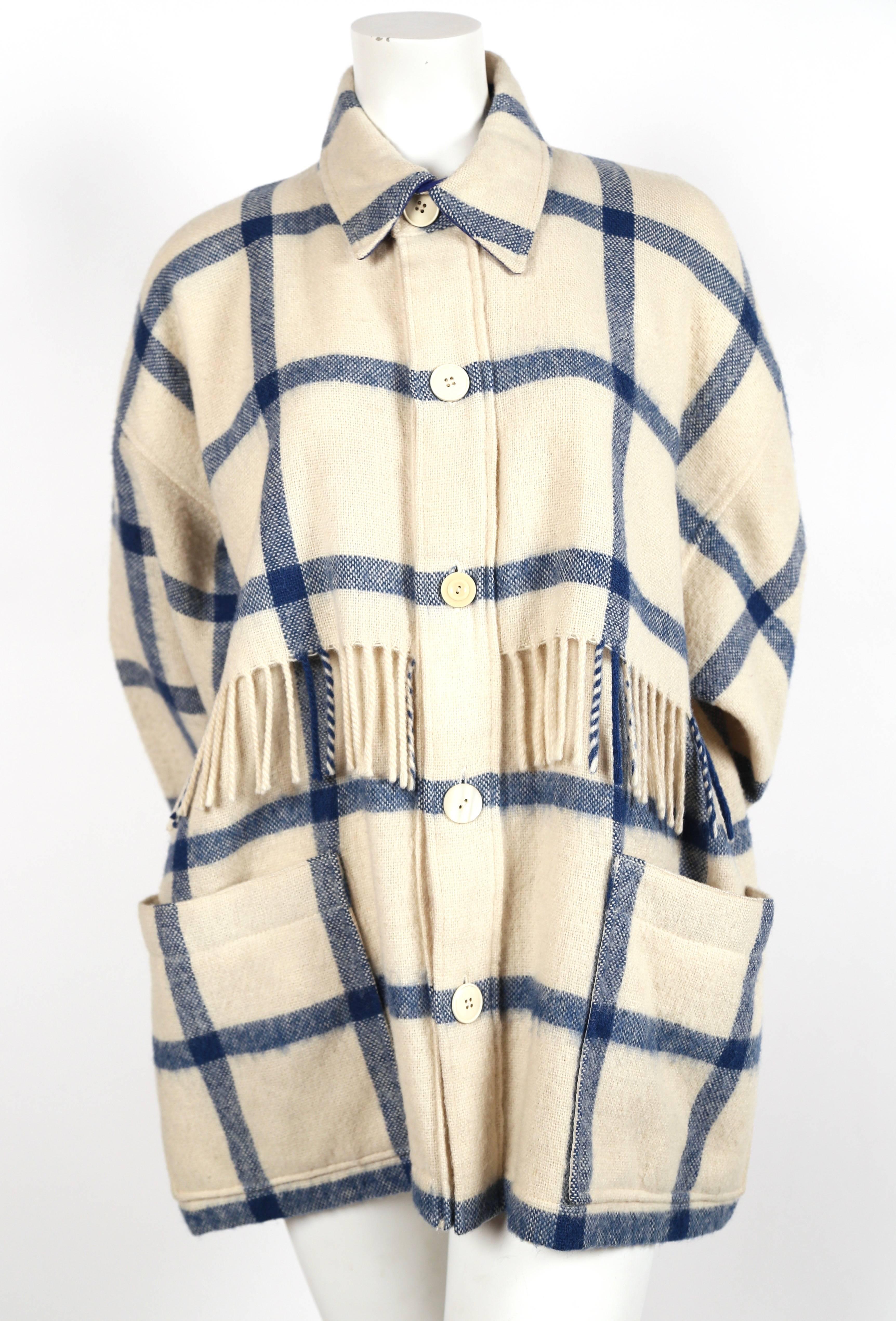 Cream and blue wool jacket and matching scarf with fringe designed by Jean Charles de Castelbajac dating the 1980's. Oversized cut best fits a medium or large. Made in France. Button closure. Pockets at hips. Very good condition. 