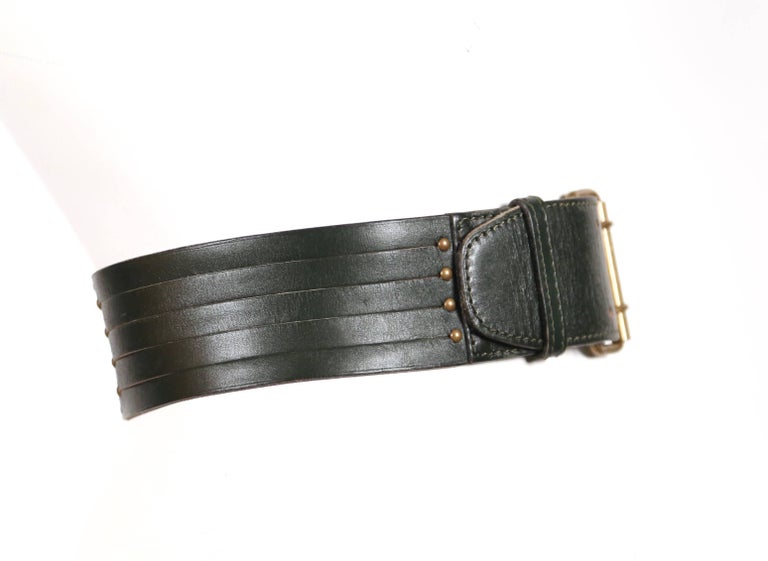 Black 1990's AZZEDINE ALAIA darkest green leather belt with brass hardware For Sale