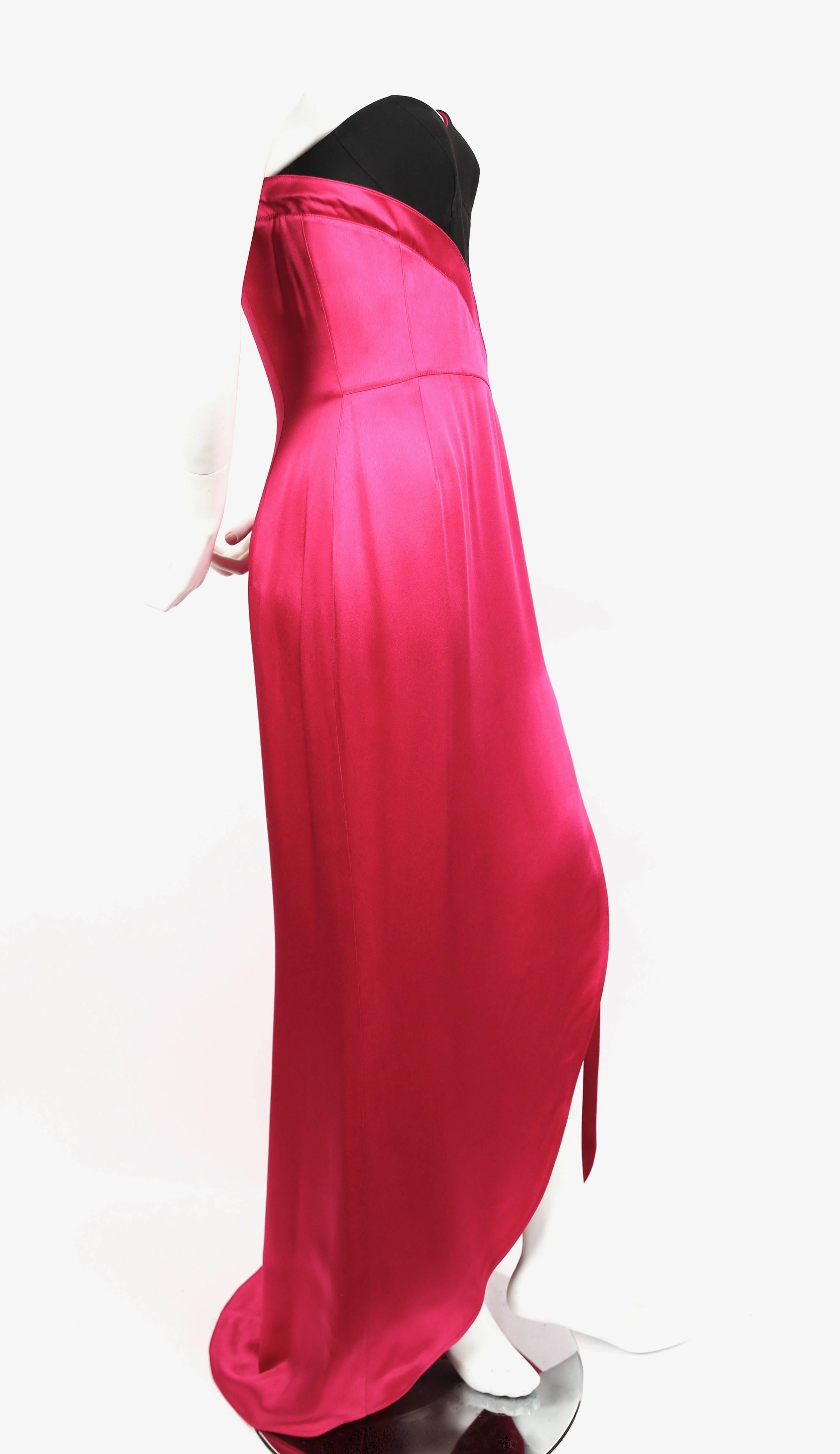 Stunning fuchsia charmeuse gown with seamed black bodice designed by Thierry Mugler dating to the early 1990's. Dress is labeled a French size 40, which is best suited for a US 4 or small 6 (bodice is small). Approximate measurements are as follows: