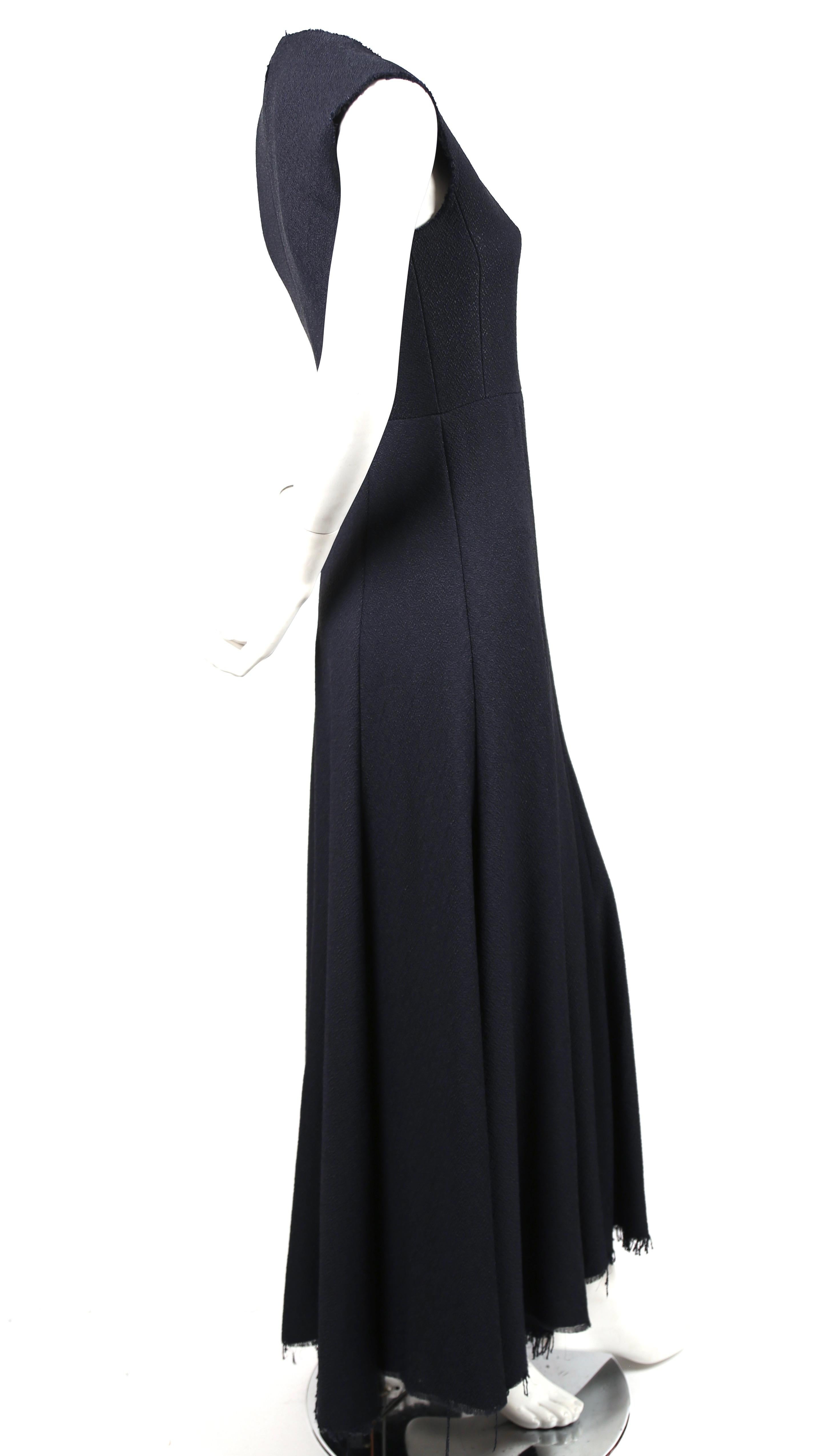 Very rare, navy blue seamed maxi dress with raw edges and fringed hemline designed by Phoebe Philo for Celine exactly as seen on the 2013 spring runway and featured in the spring 2013 Celine ad campaign. This is a very difficult to find dress.