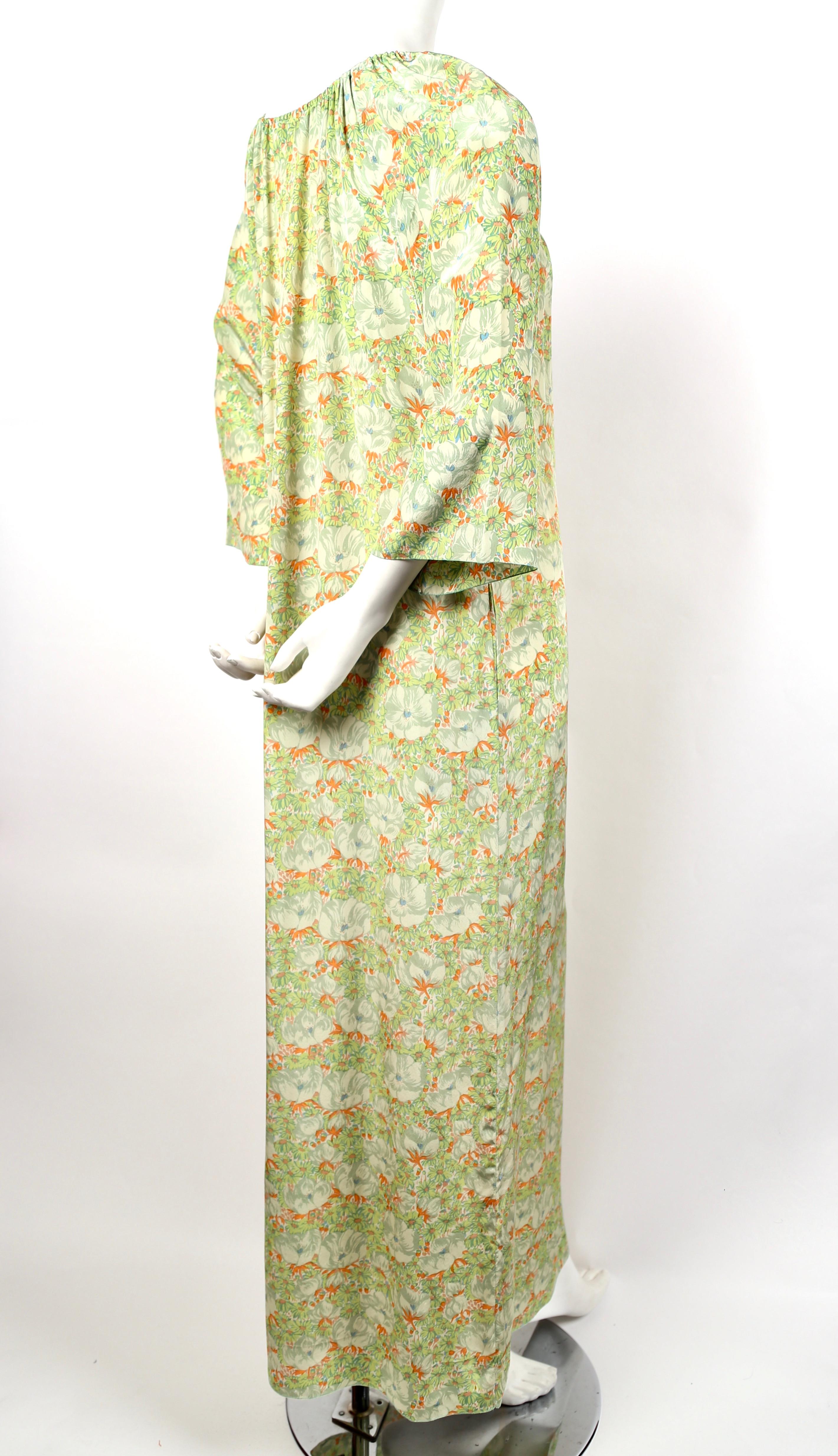 Floral printed silk caftan designed by Christian Dior dating to the 1970's. Fits a US 2-8. Approximate measurements: bust 40
