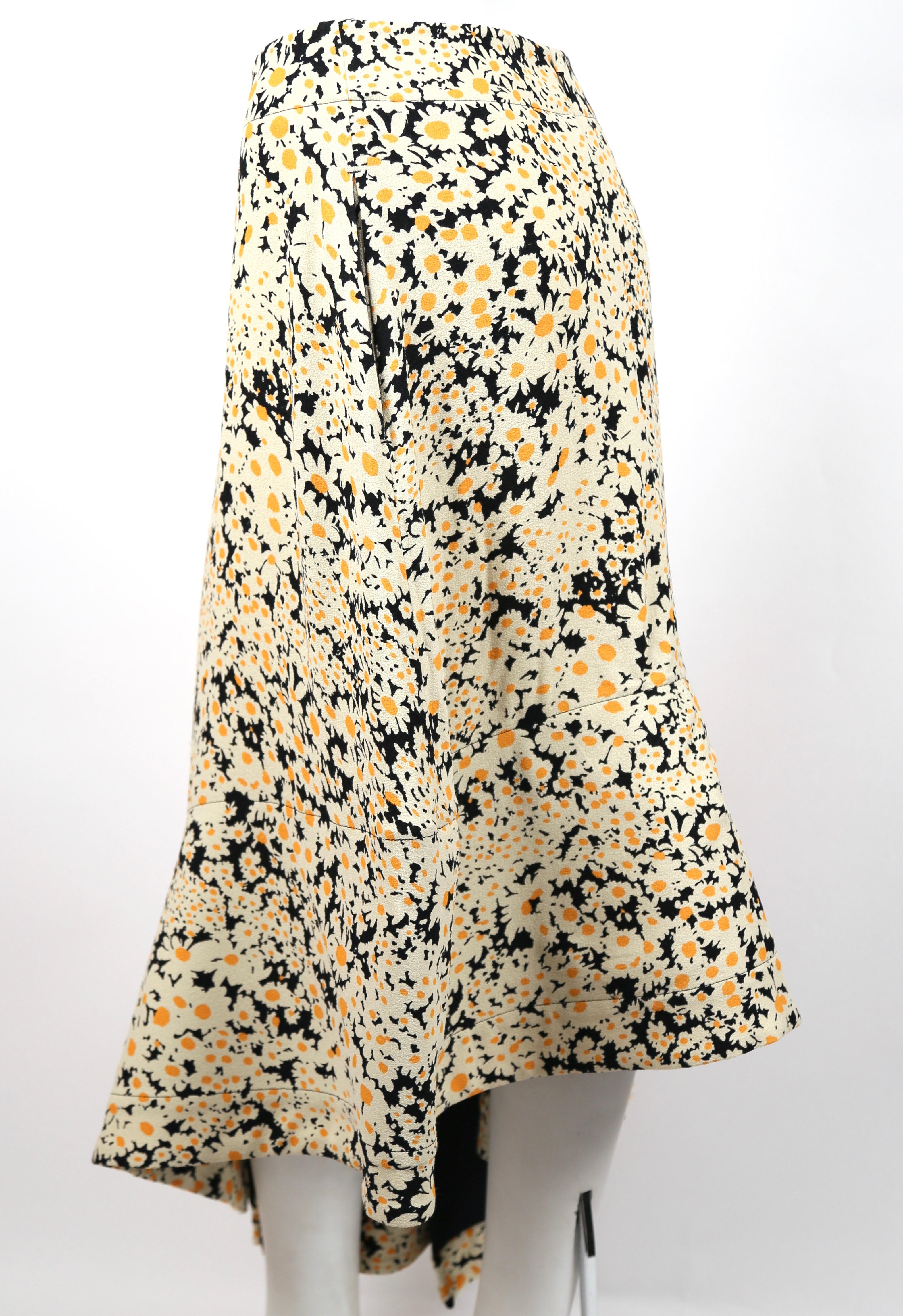 Floral printed crepe skirt with asymmetrical hem and flounce designed by Phoebe Philo for Celine exactly as seen on the spring 2015 runway. French size 38. Approximate measurements: waistband 28