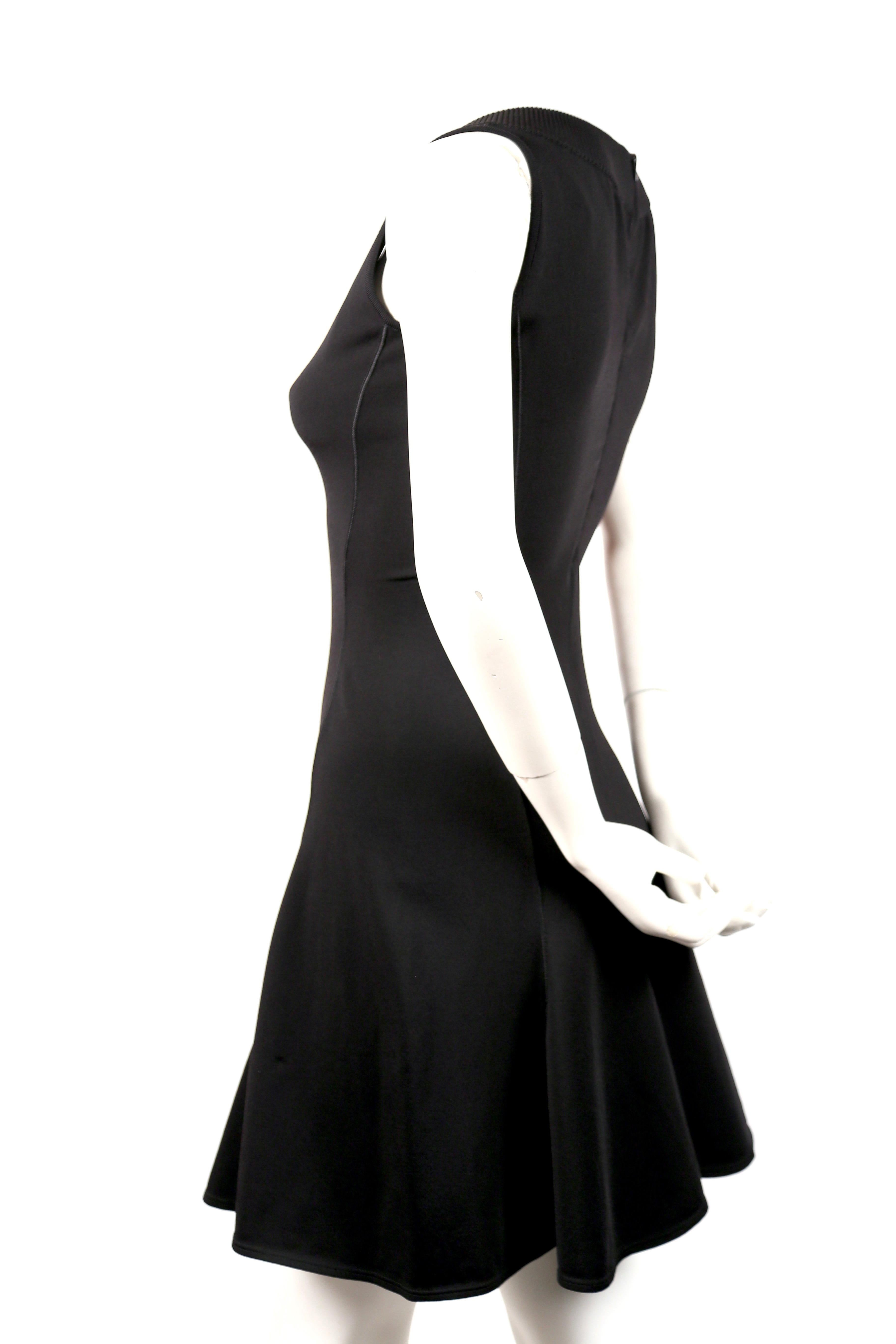 Women's or Men's Azzedine Alaia black flared sleeveless dress with V neckline, 1990s