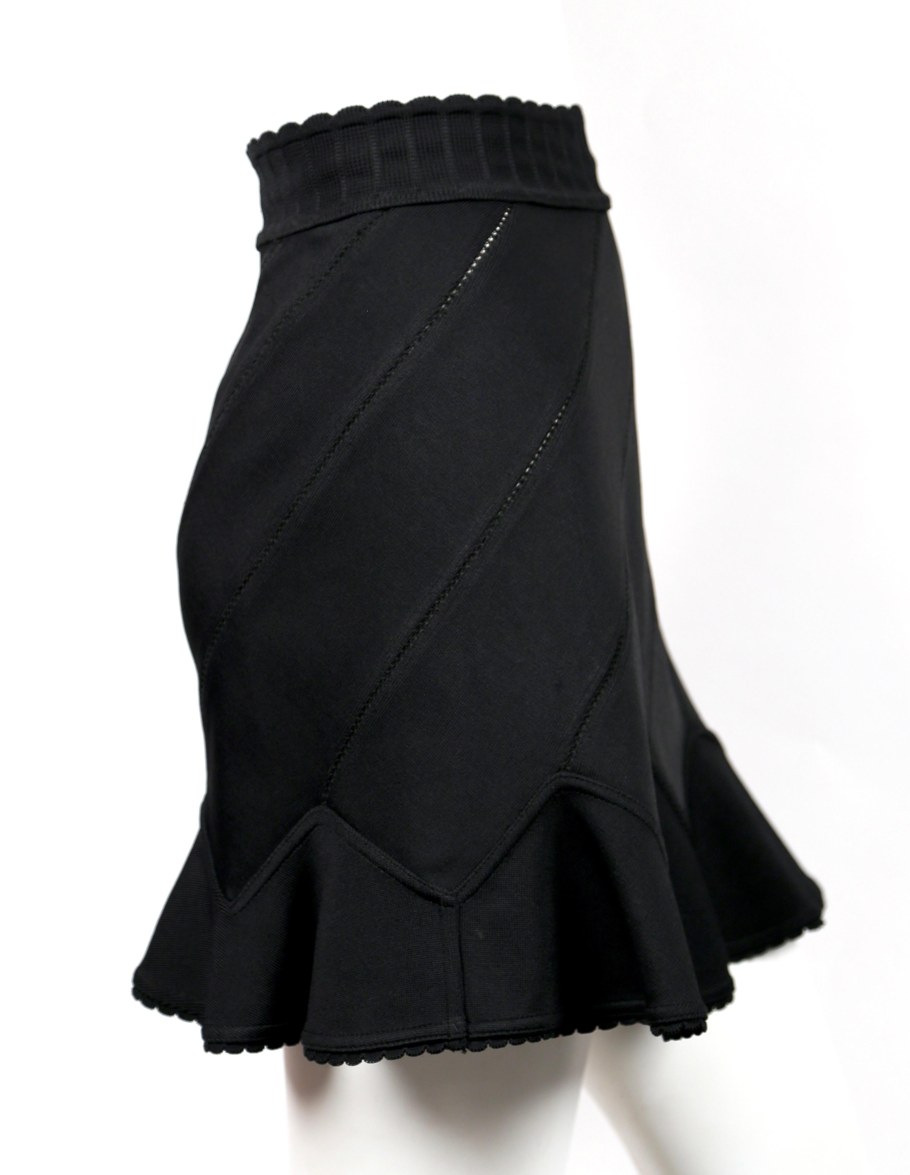 Black 1992 AZZEDINE ALAIA black pointelle knit skirt with spiral seams & flounced hem